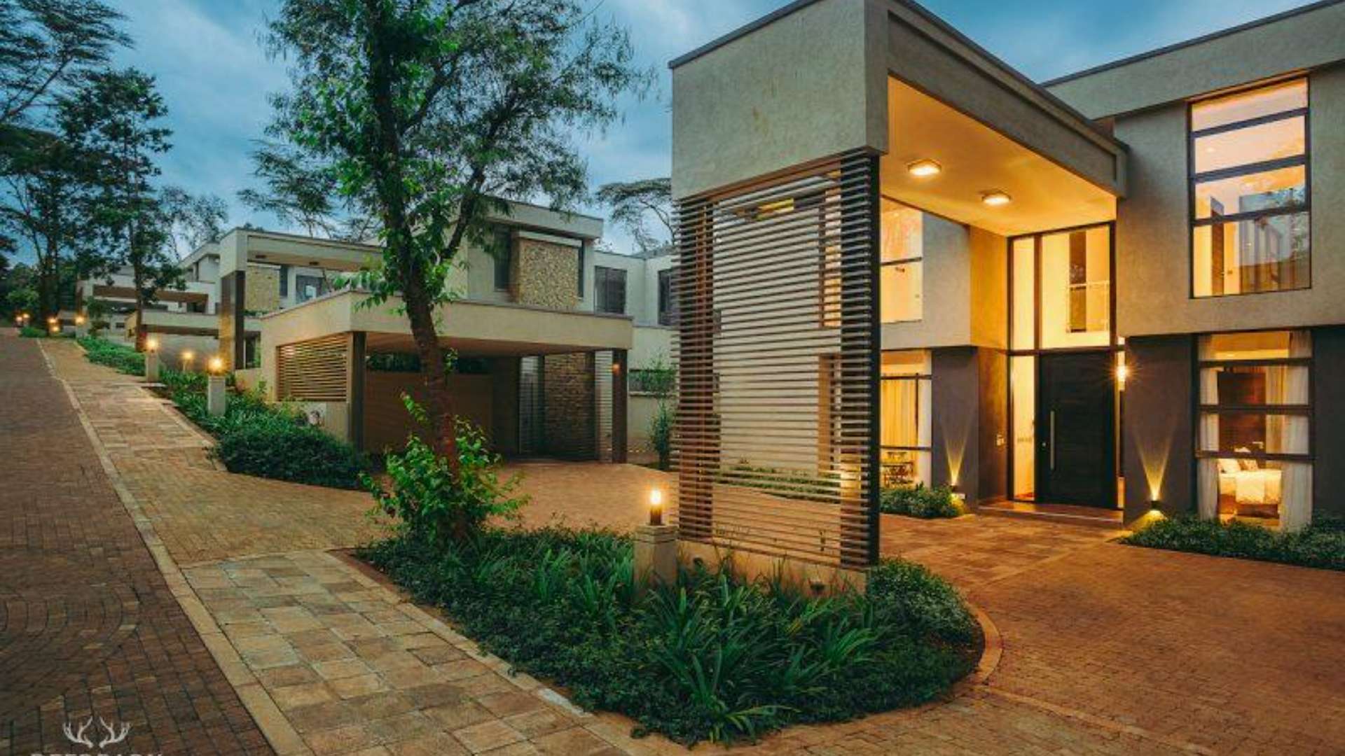 Modern five-bedroom villa exterior in Karen, Nairobi, surrounded by lush greenery