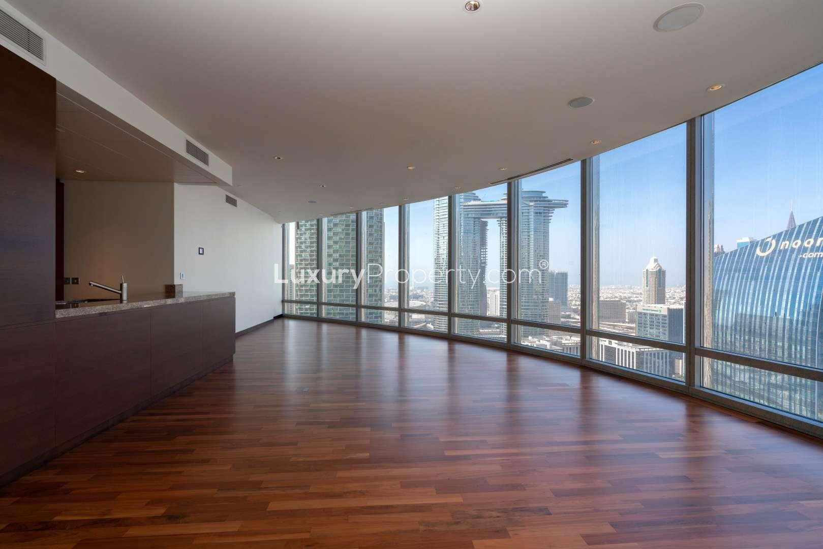 Spacious living area with panoramic windows in Burj Khalifa apartment, Downtown Dubai