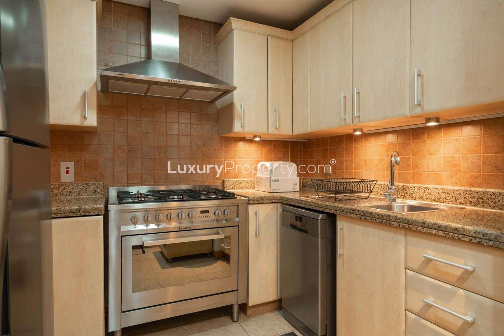 Bright bedroom in Shoreline Residences apartment, Palm Jumeirah, with modern furnishings and natural light