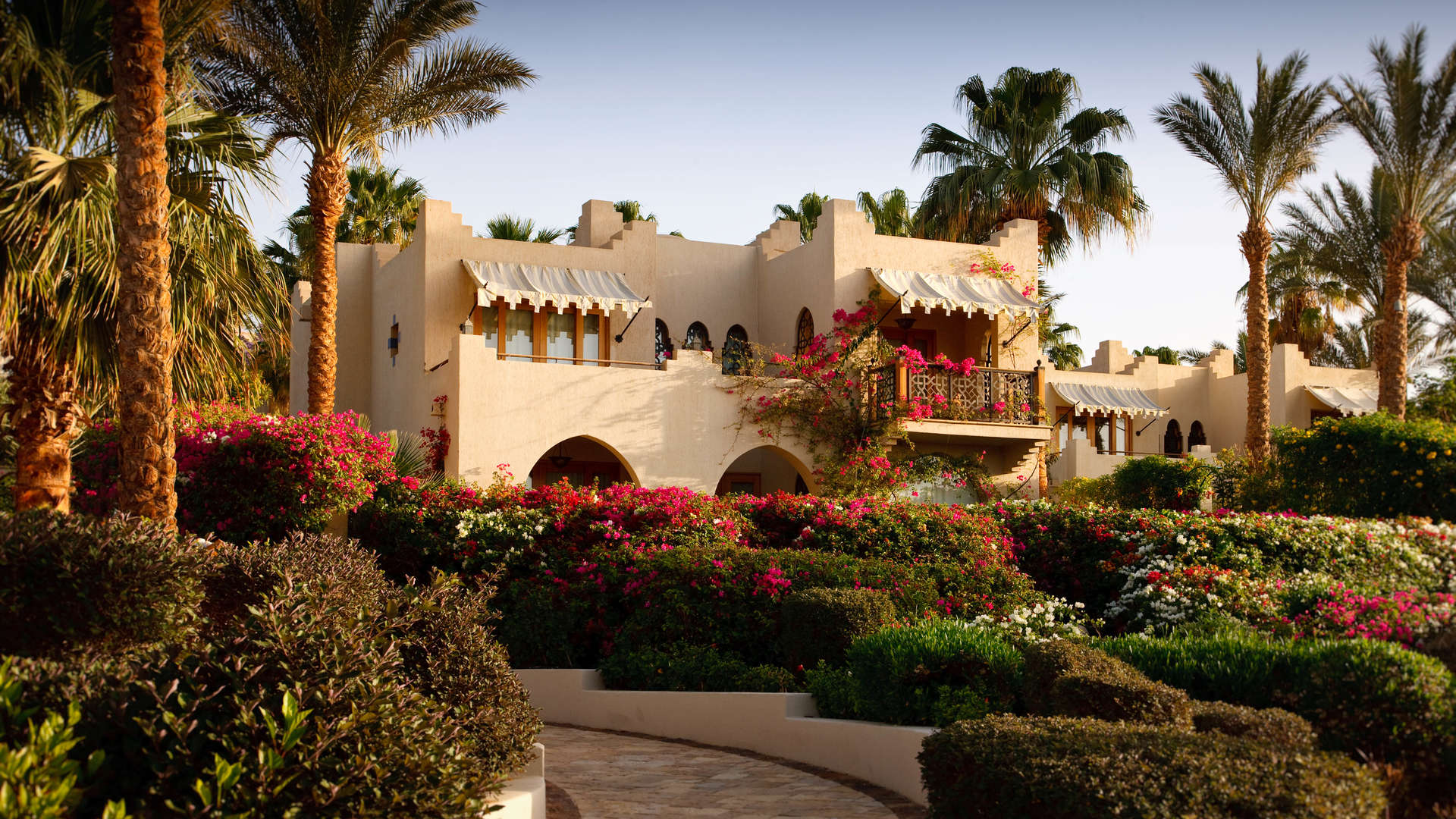 Luxurious Four Seasons Private Residences exterior with lush gardens in Sharm el Sheikh