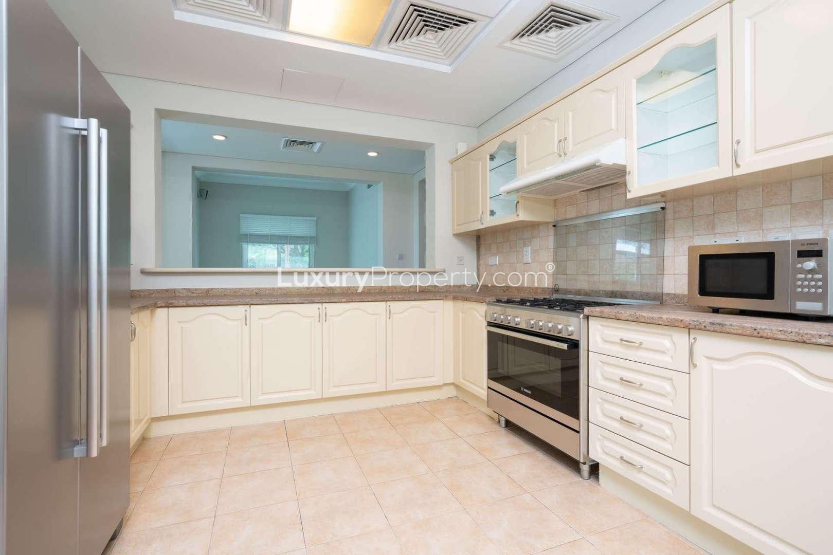 Bright villa interior with garden view in Victory Heights, Dubai Sports City