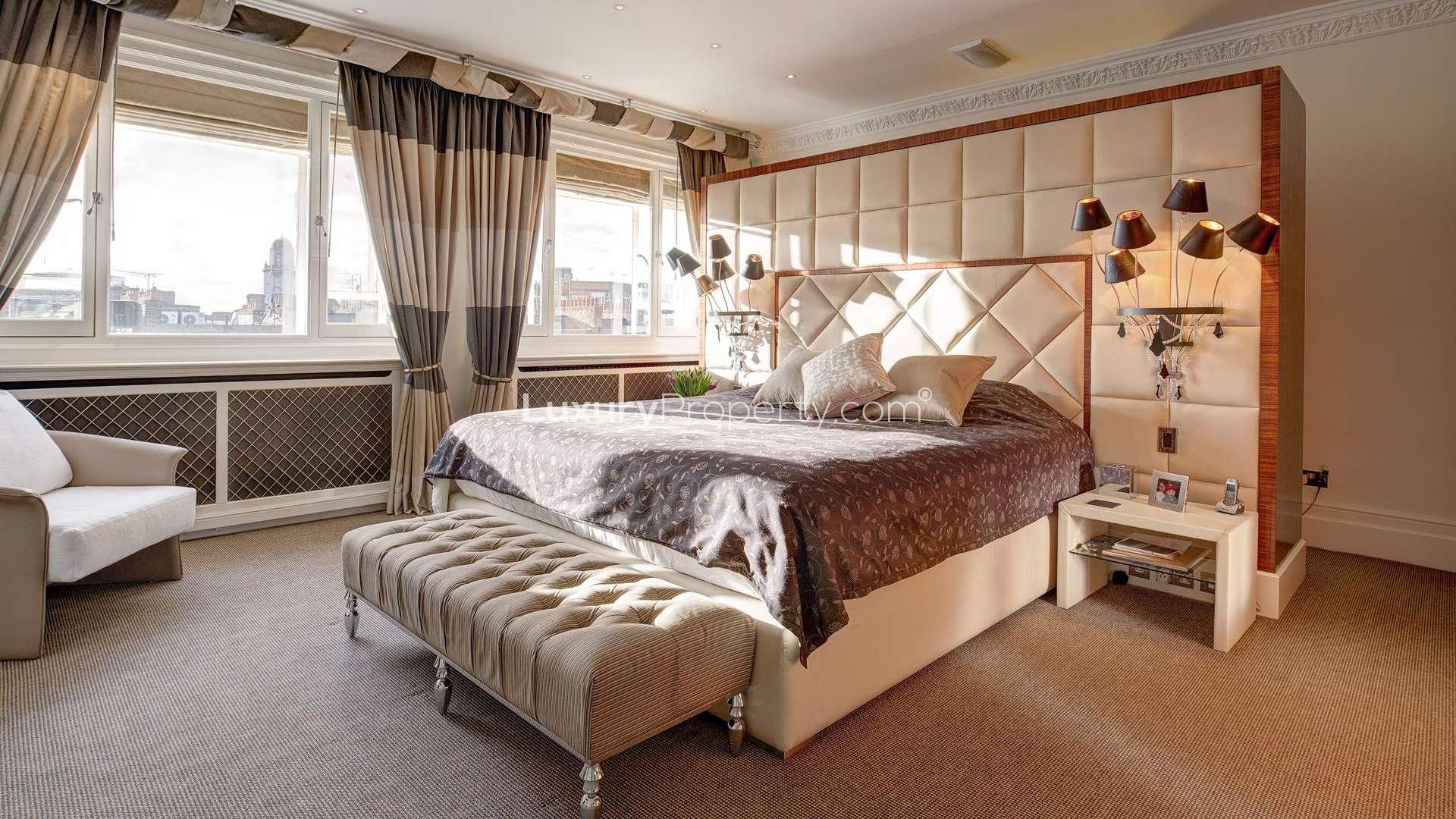 Luxurious kitchen in Eaton Square penthouse, Belgravia, featuring modern appliances and wooden cabinetry
