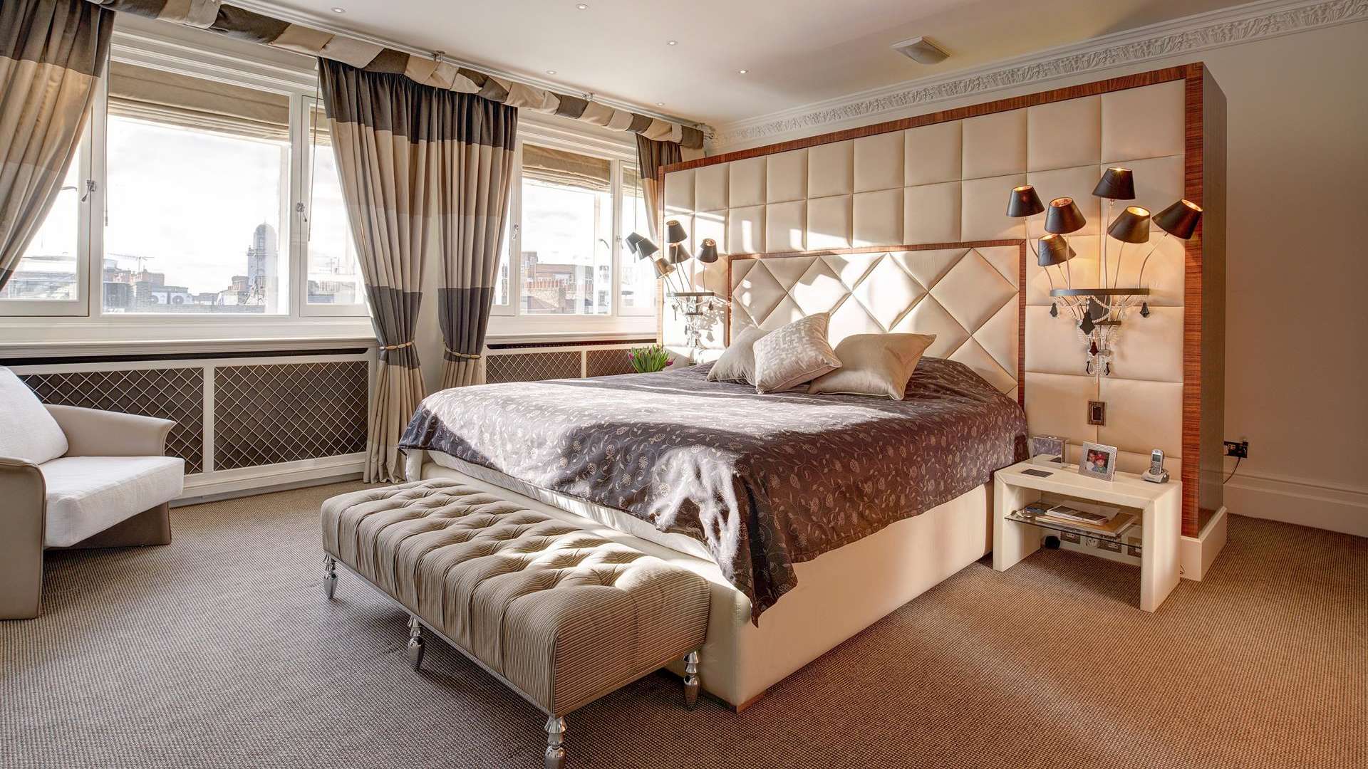 Luxurious kitchen in Eaton Square penthouse, Belgravia, featuring modern appliances and wooden cabinetry