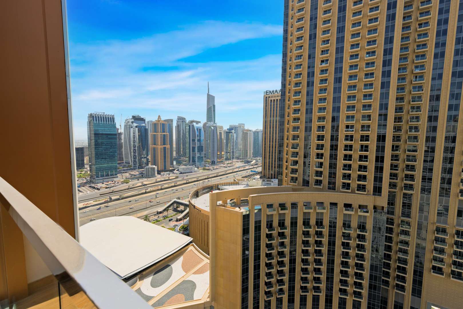 Modern bedroom in Marina Moon Tower apartment, Dubai Marina, with TV and stylish decor