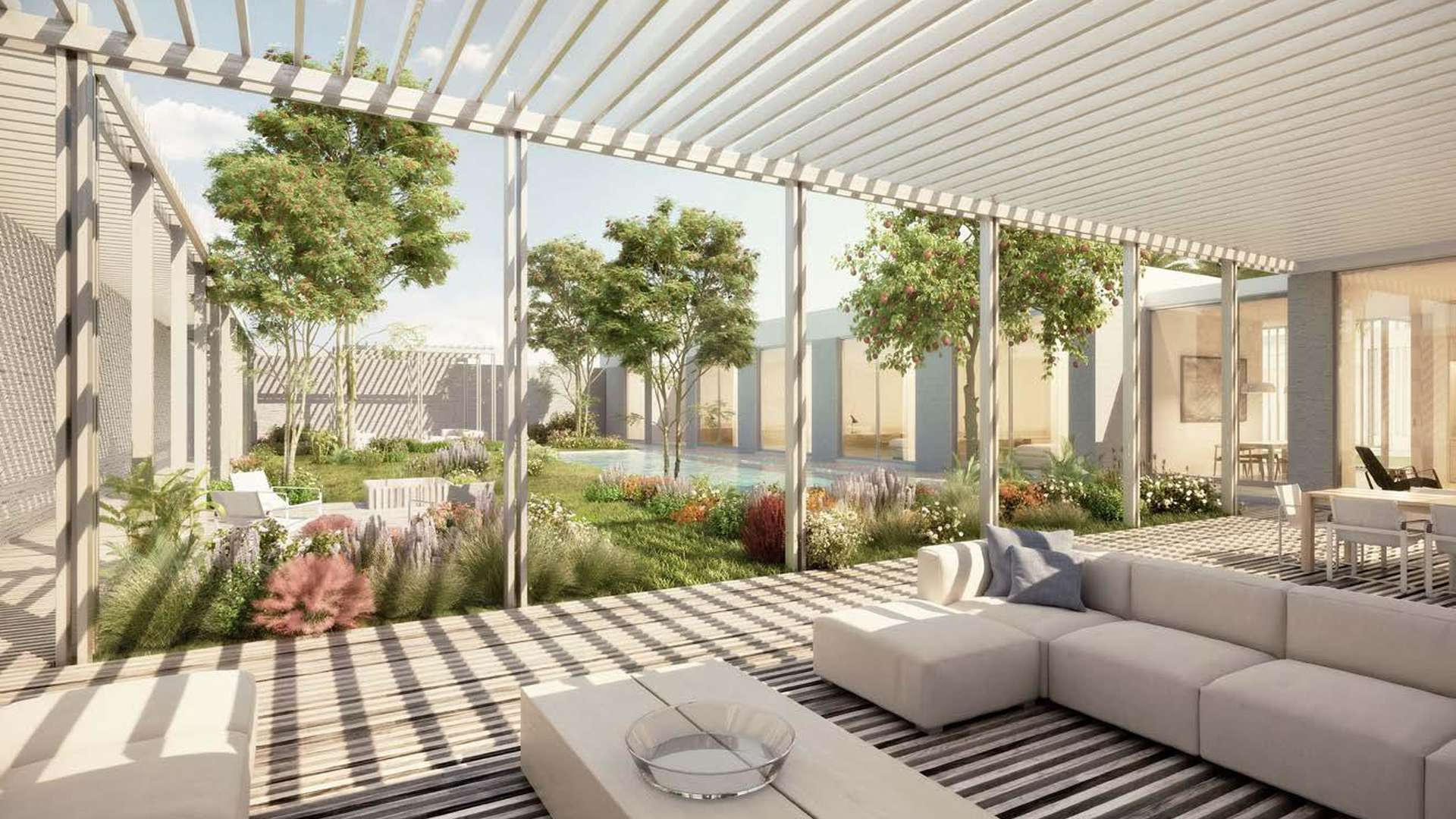 Luxurious living room in Al Jurf Gardens Villa, Abu Dhabi with modern decor and pool view