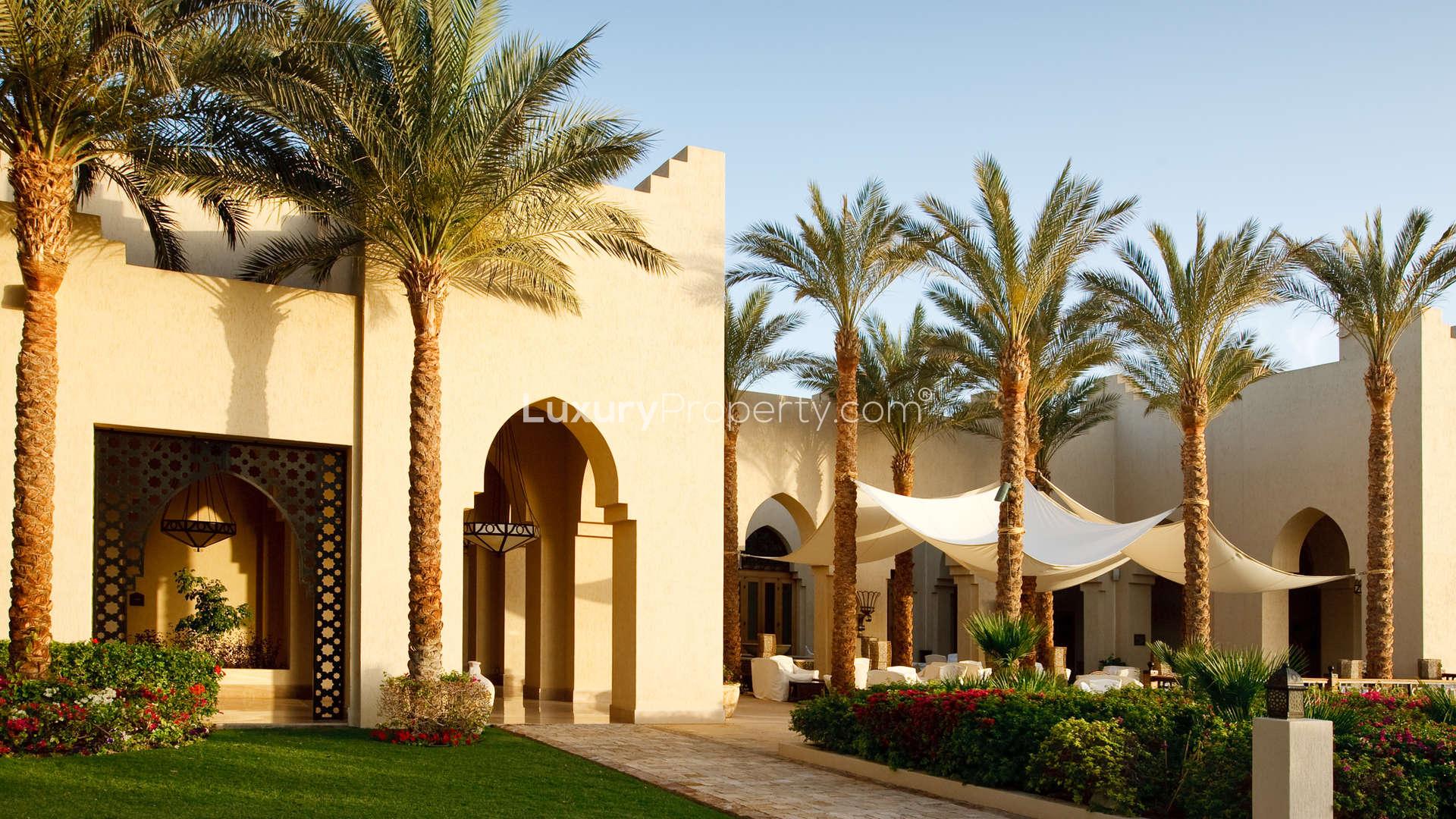 Luxurious Four Seasons Private Residences courtyard with lanterns and lush greenery in Sharm el Sheikh