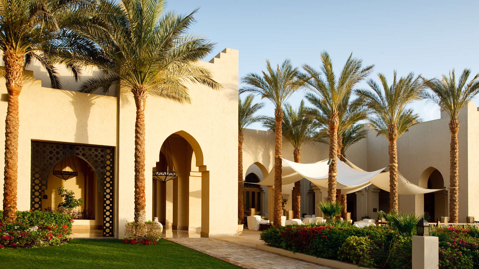 Luxurious Four Seasons Private Residences courtyard with lanterns and lush greenery in Sharm el Sheikh