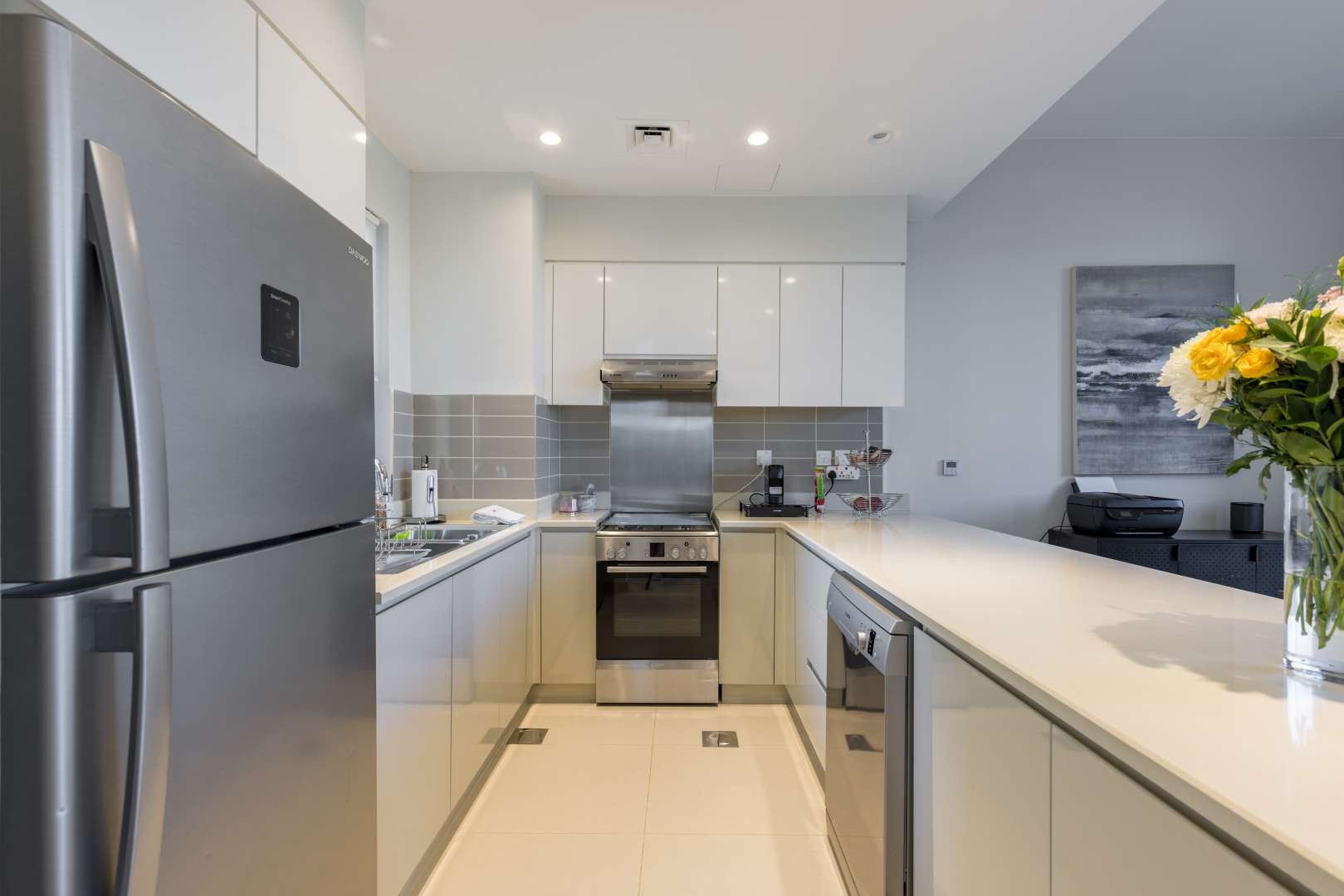 Elegant living room in Maple townhouse, Dubai Hills Estate, with large windows and garden view