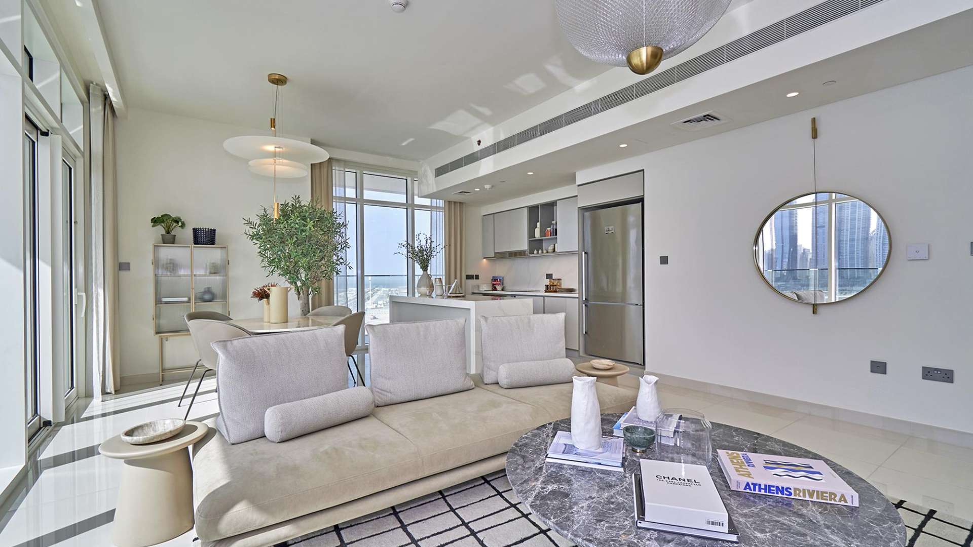 Modern living room with panoramic windows in two-bedroom apartment, Sunrise Bay, Emaar Beachfront, Dubai