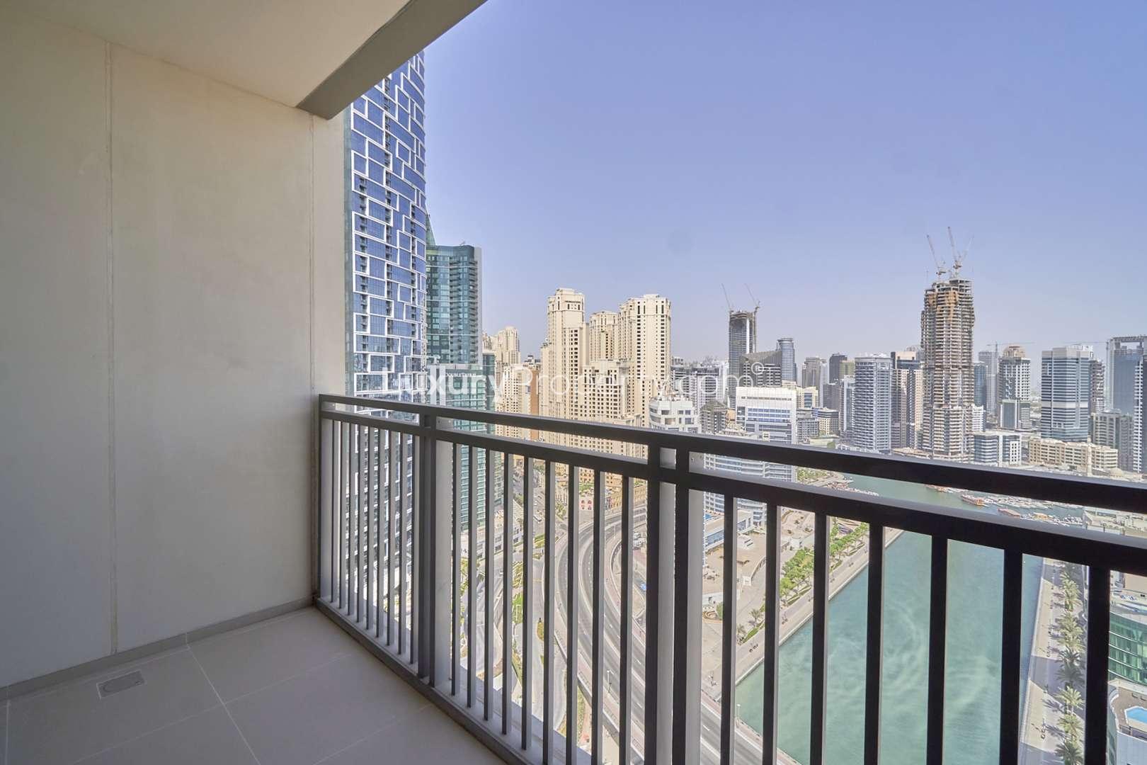 Modern bathroom in 3-bedroom apartment, 52|42 Dubai Marina, featuring glass shower and marble sink