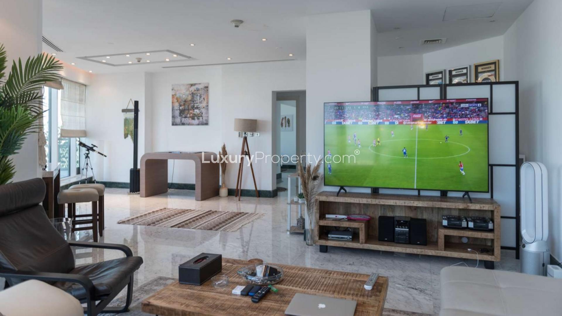 Rooftop terrace with seating and skyline view, Madison Residency, Barsha Heights apartment