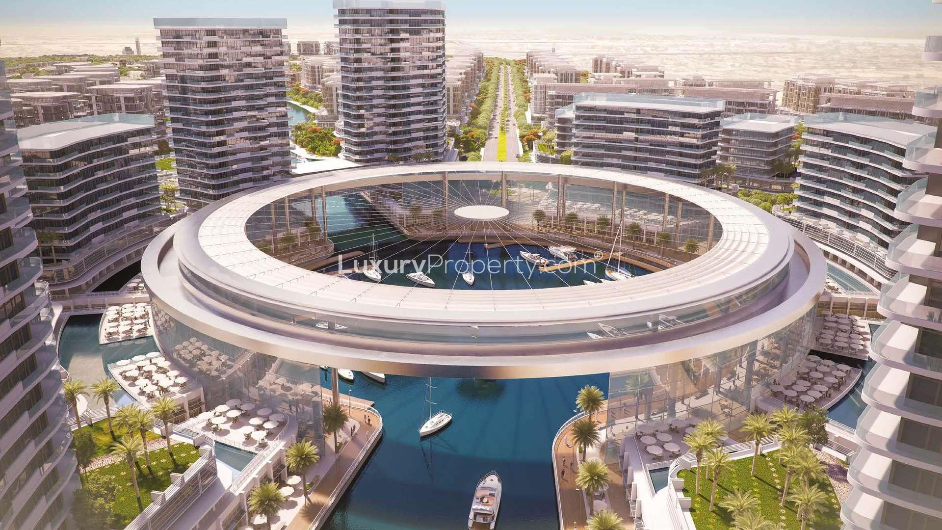 Sunset view of Dubai skyline from Marsa Meydan beachfront luxury apartment community in Jabel Ali