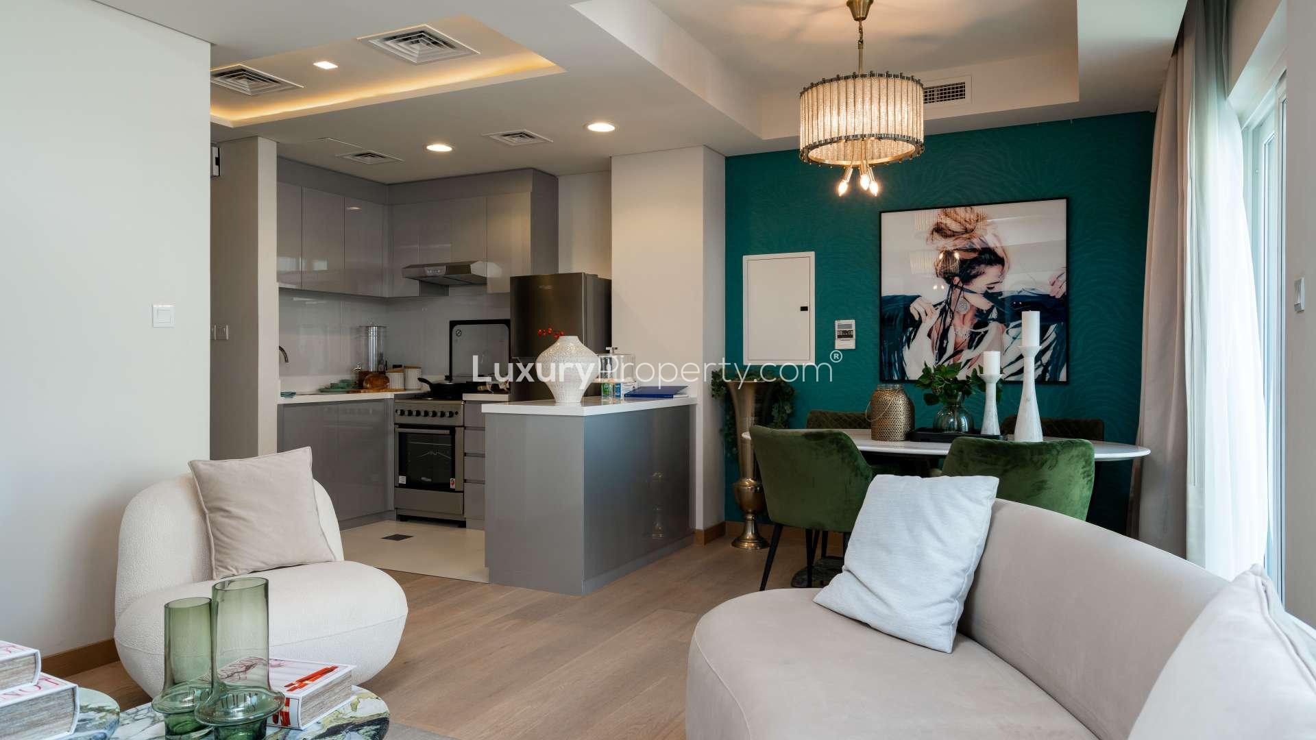 Modern living room in Just Cavalli Villa, Damac Hills 2, with chic decor and art