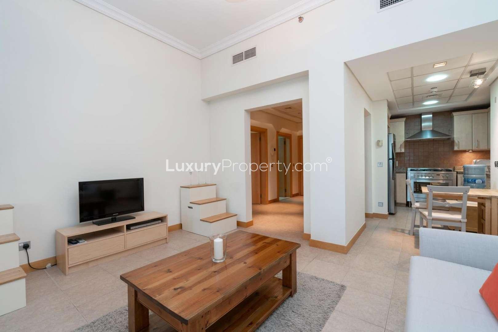 Vacant ground floor apartment living room in Shoreline, Palm Jumeirah, with modern furnishings