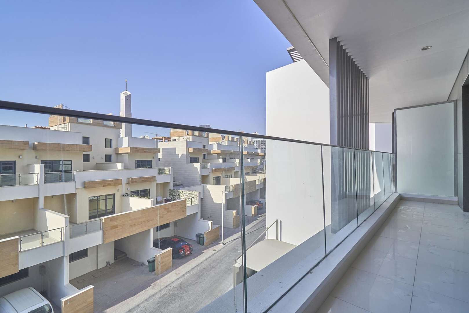 Balcony view from 1-bedroom apartment in Jumeirah Village Circle, Al Manal Elite community