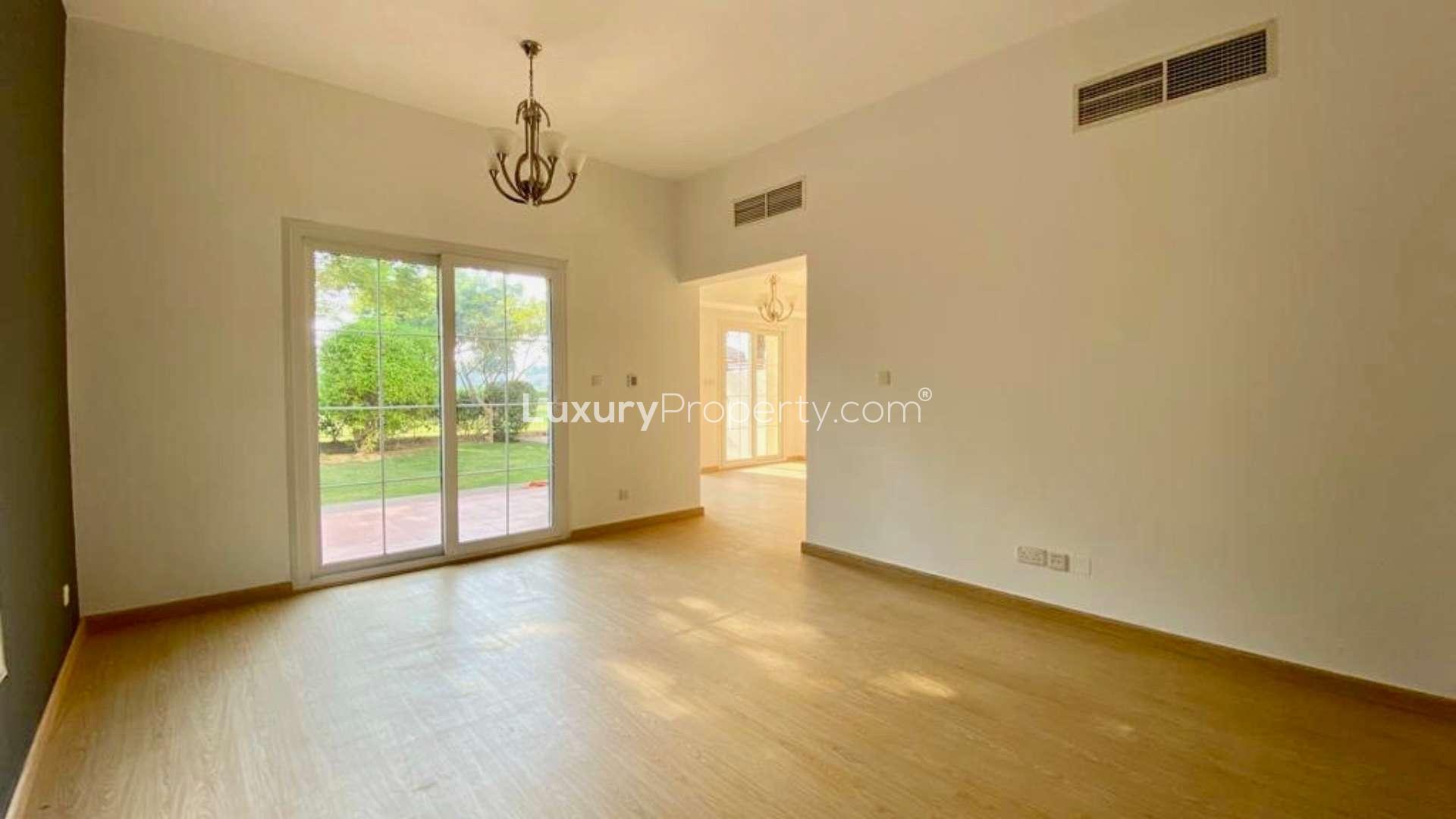 "Bright villa living room with garden view in Springs 3, three-bedroom rental property.",Bright villa interior with garden view, Springs 3, 3-bed, 3-bath, for rent