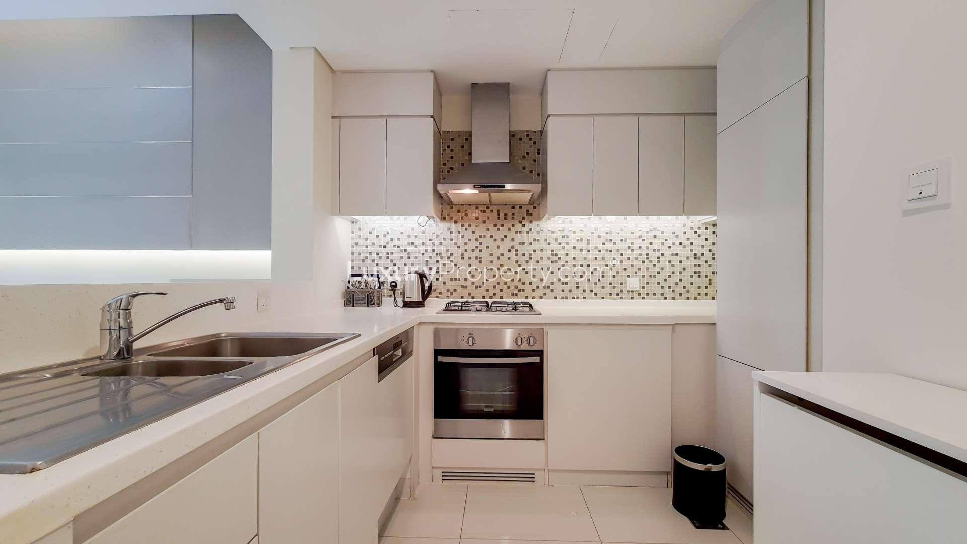 Modern living room with skyline views in Business Bay apartment for rent