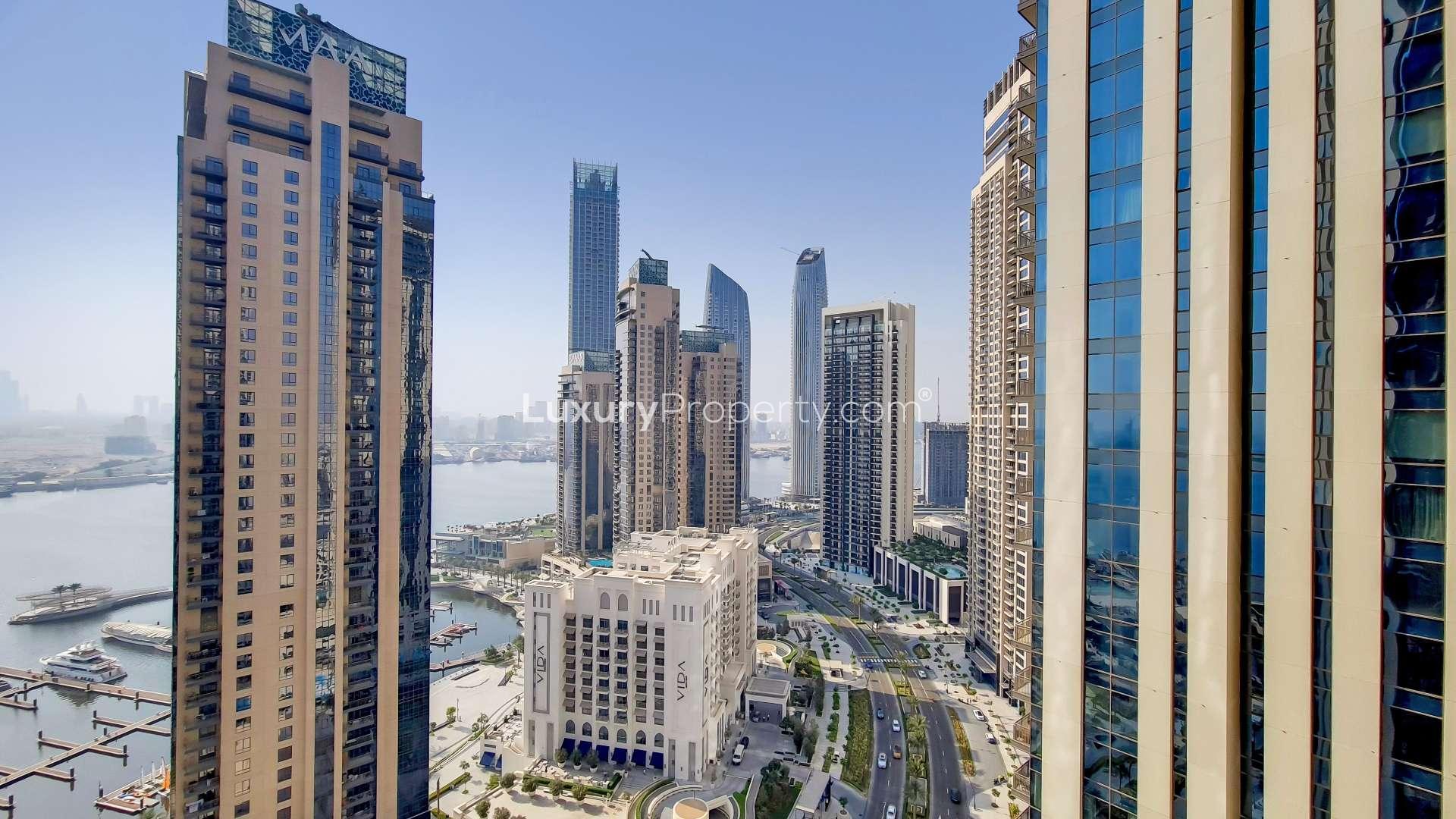 Mid-floor apartment balcony with stunning creek view, Creekside 18, for rent