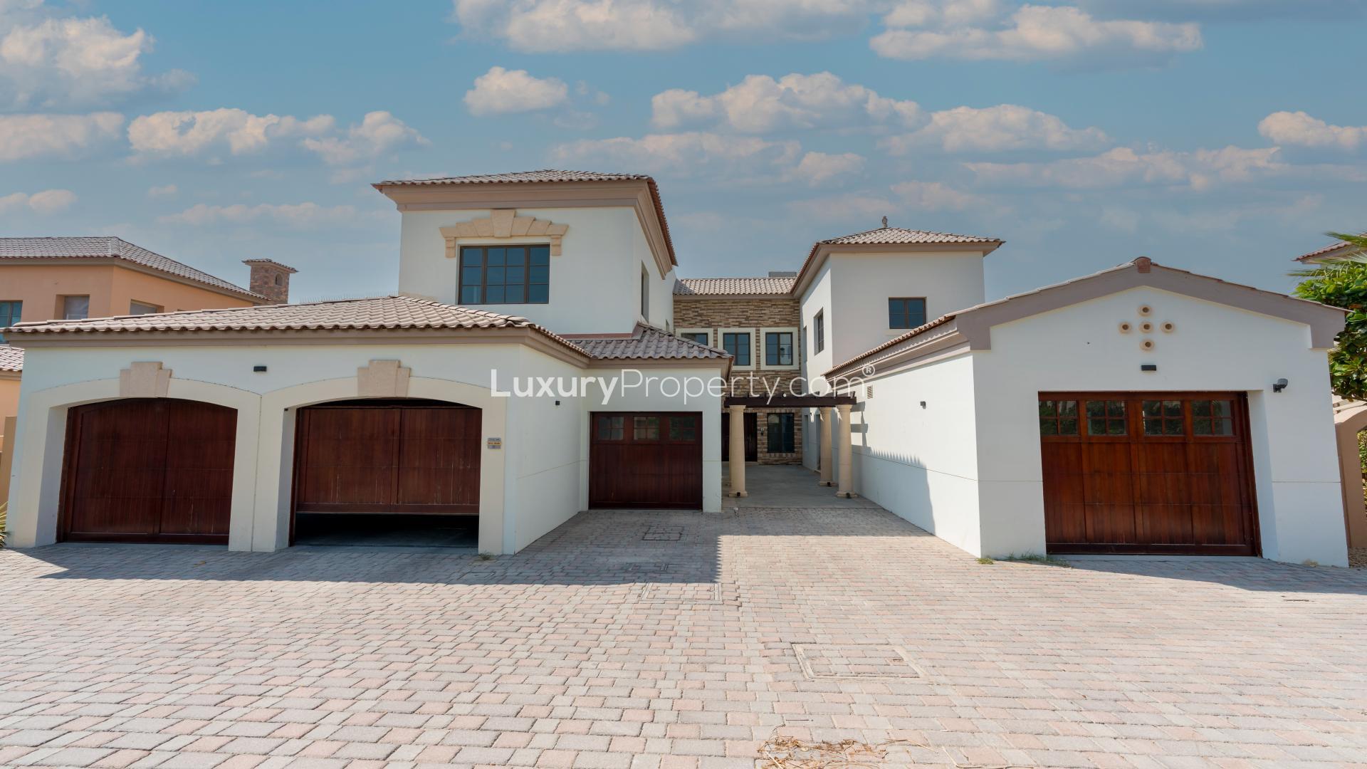 Upgraded villa exterior in Redwood Avenue, Jumeirah Golf Estates, available for rent