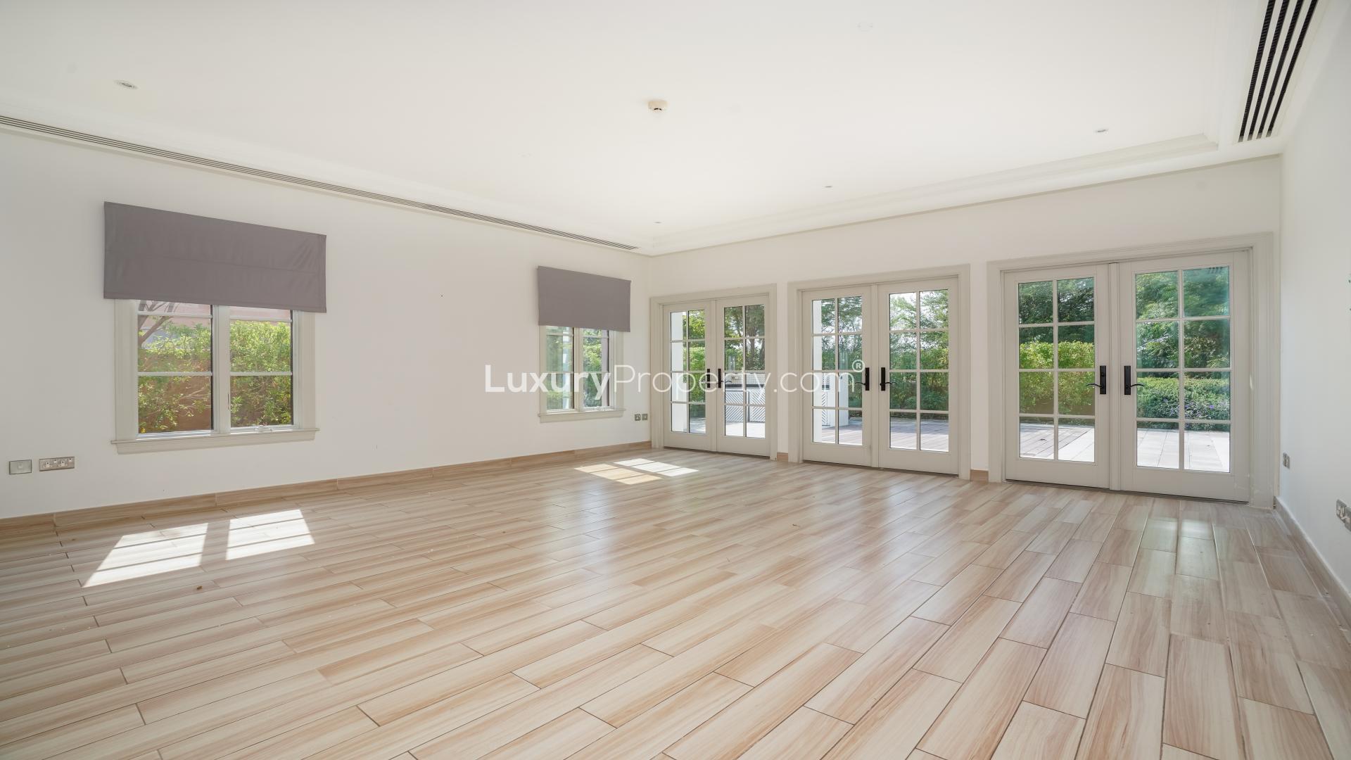 Spacious living room in upgraded Redwood Avenue villa, Jumeirah Golf Estates, for rent