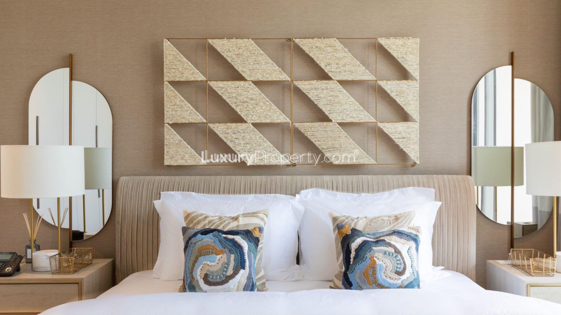 Luxury Bluewaters Island apartment bedroom with sea view, modern decor, natural light