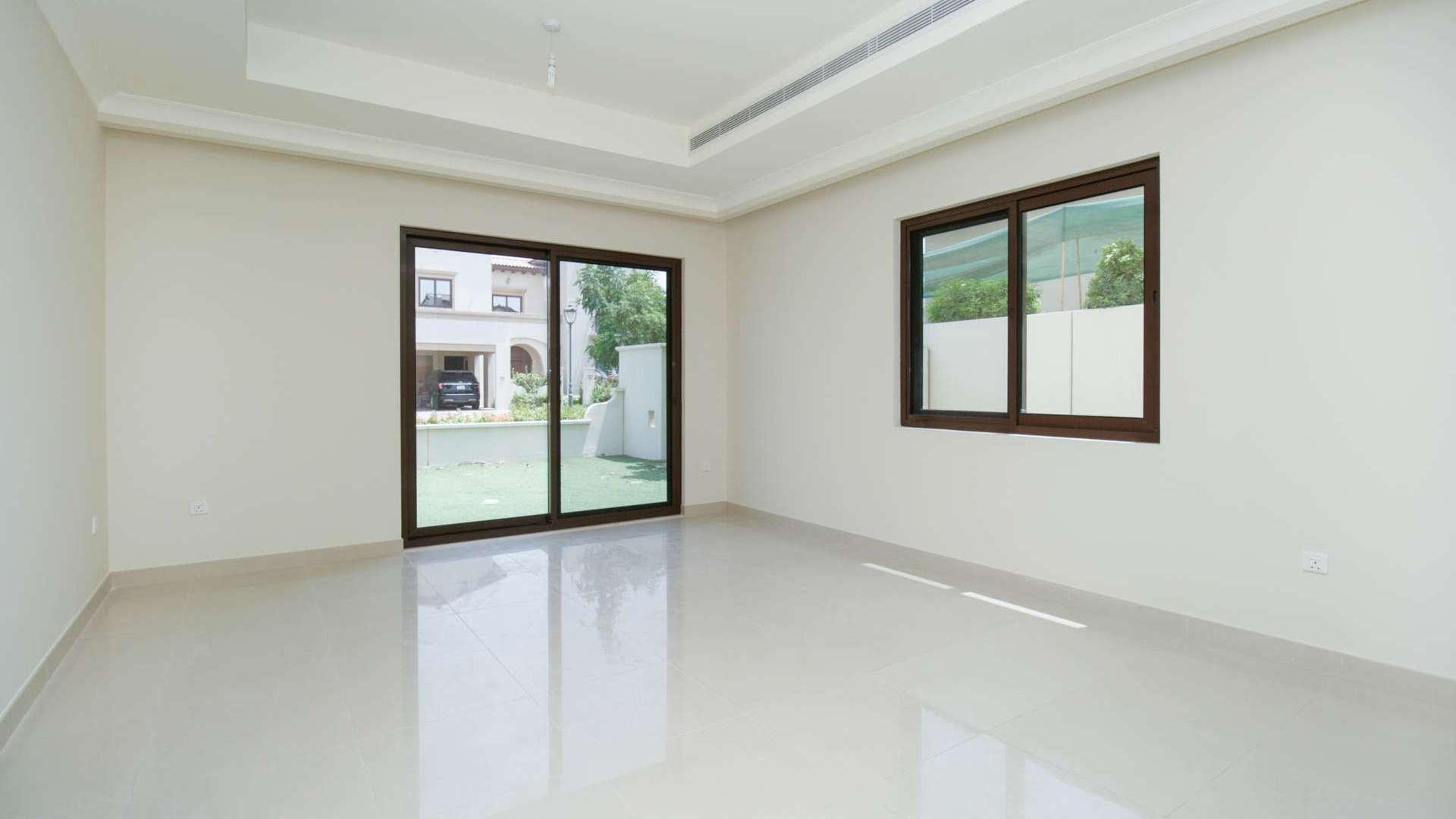 Interior view of spacious villa in Rasha, Arabian Ranches 2, with elegant staircase