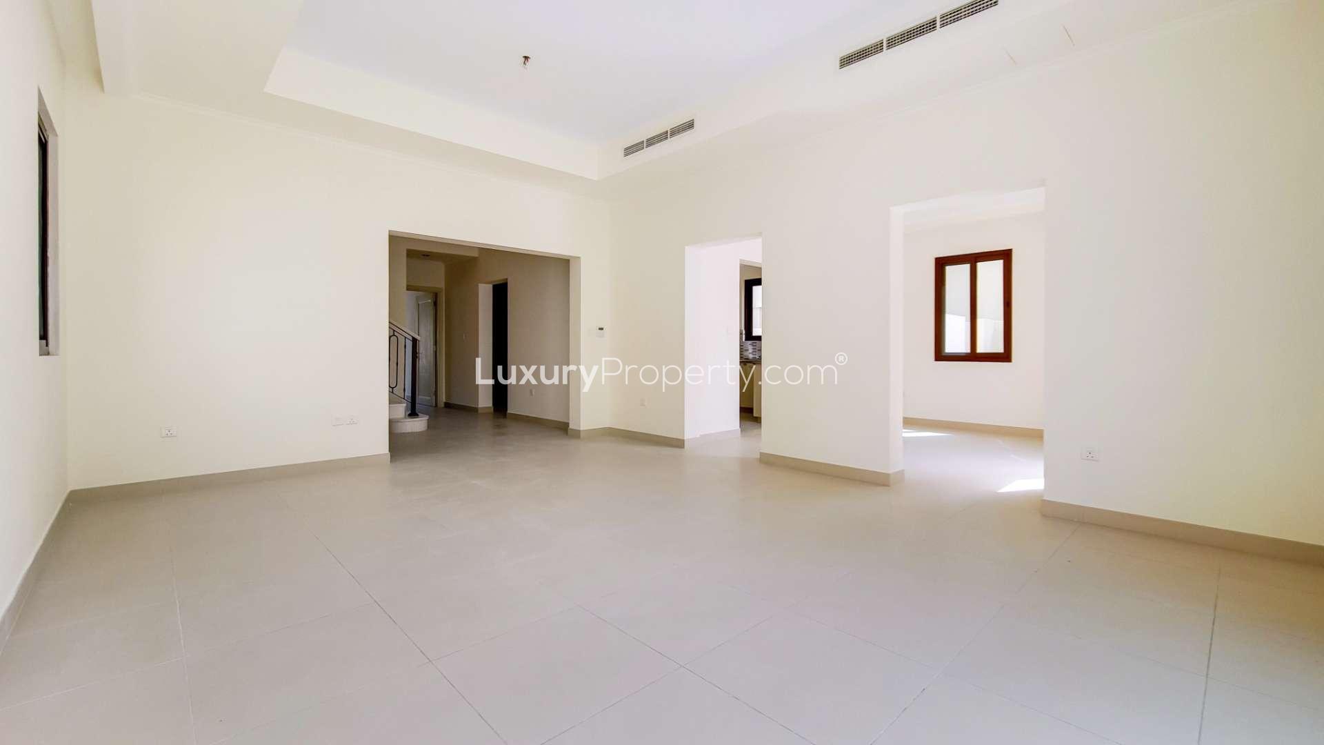 "Spacious balcony view in Lila, Arabian Ranches 2 villa for rent, single row, peaceful community.",Spacious living area in Arabian Ranches 2 Lila villa for rent, single row design