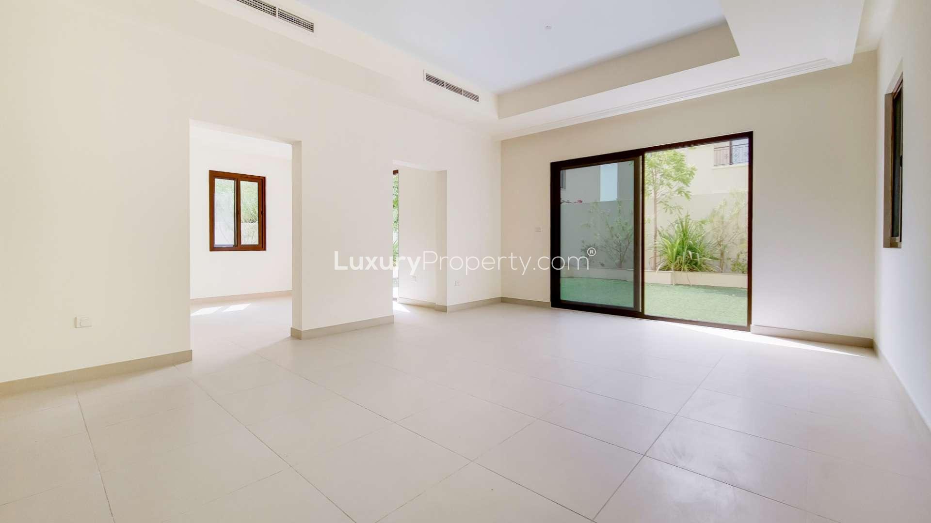 Rare single row villa exterior in Lila, Arabian Ranches 2, with lush garden view