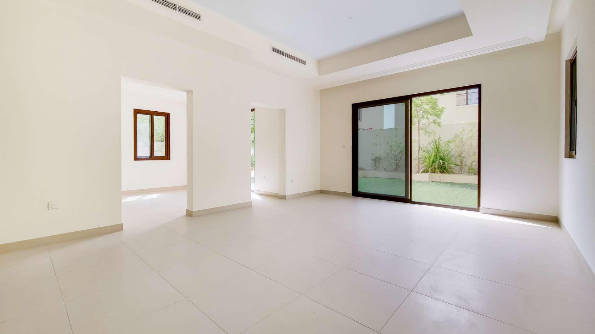 Rare single row villa exterior in Lila, Arabian Ranches 2, with lush garden view