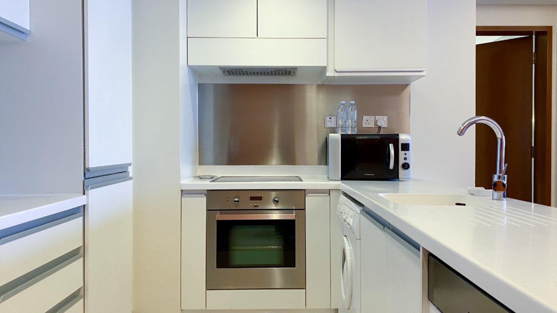 Studio apartment interior with modern furnishings in The Address Dubai Mall, Downtown Dubai