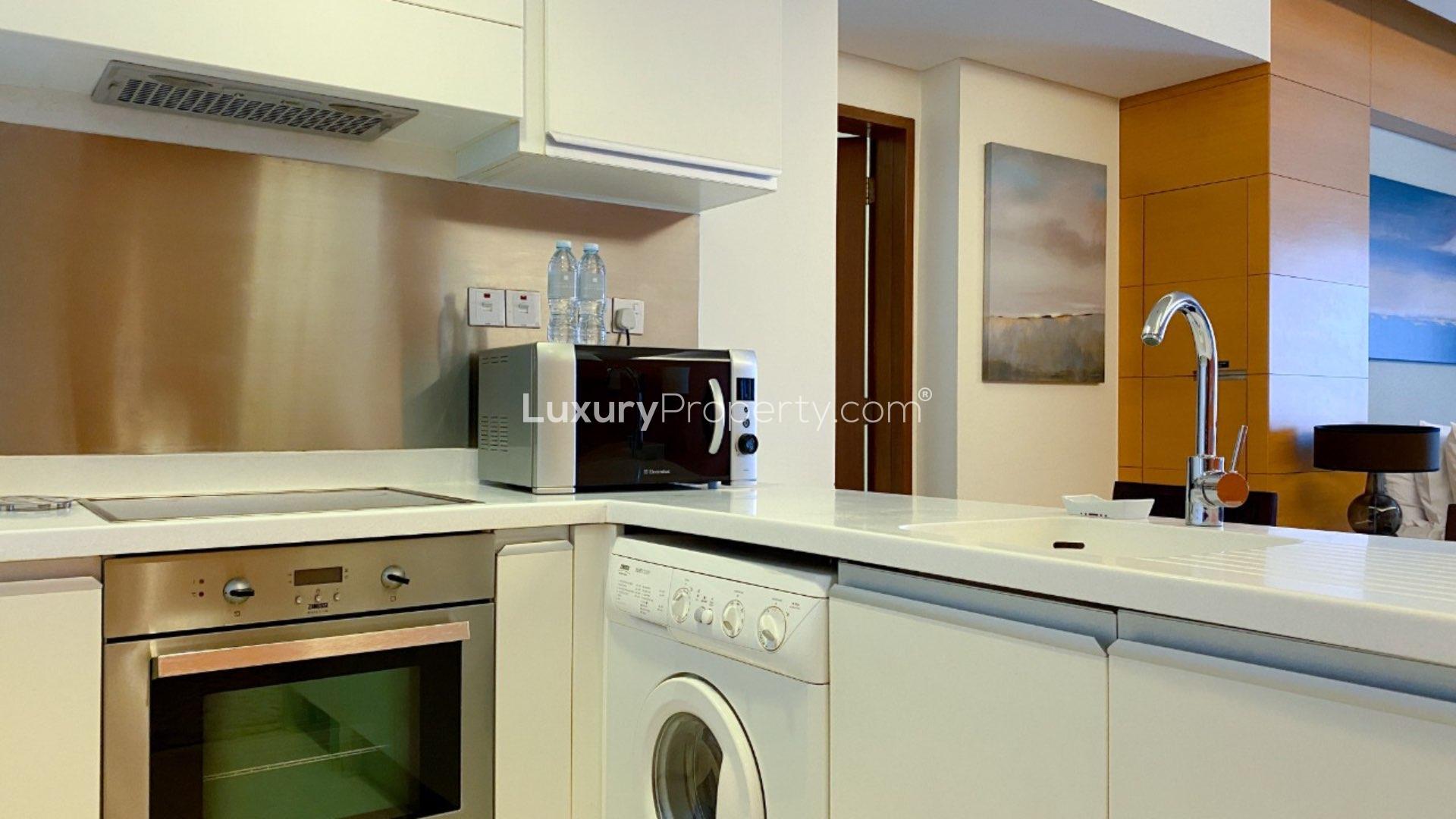 Studio apartment bedroom at The Address Dubai Mall, fully furnished and chiller free