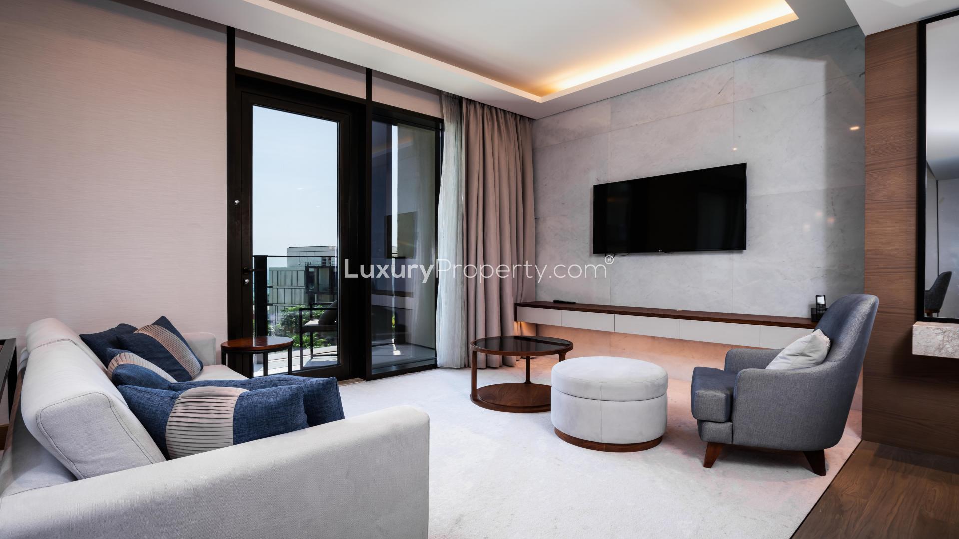 Balcony view from luxurious 1-bedroom apartment in Caesars Bluewaters Dubai, overlooking cityscape