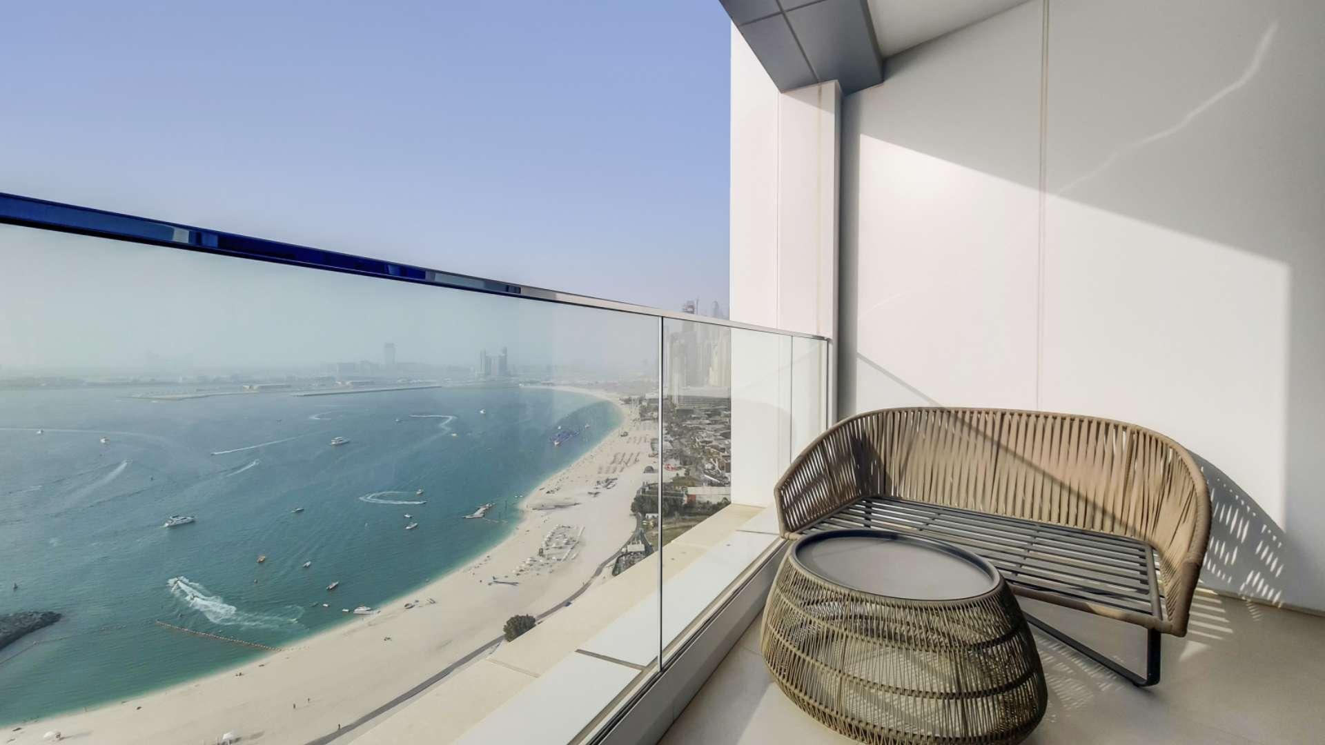 "Modern living room in beachfront apartment, sea view, Jumeirah Beach Residence, The Address Resort.",Serviced beachfront apartment balcony with stunning full sea view at Jumeirah Beach Residence
