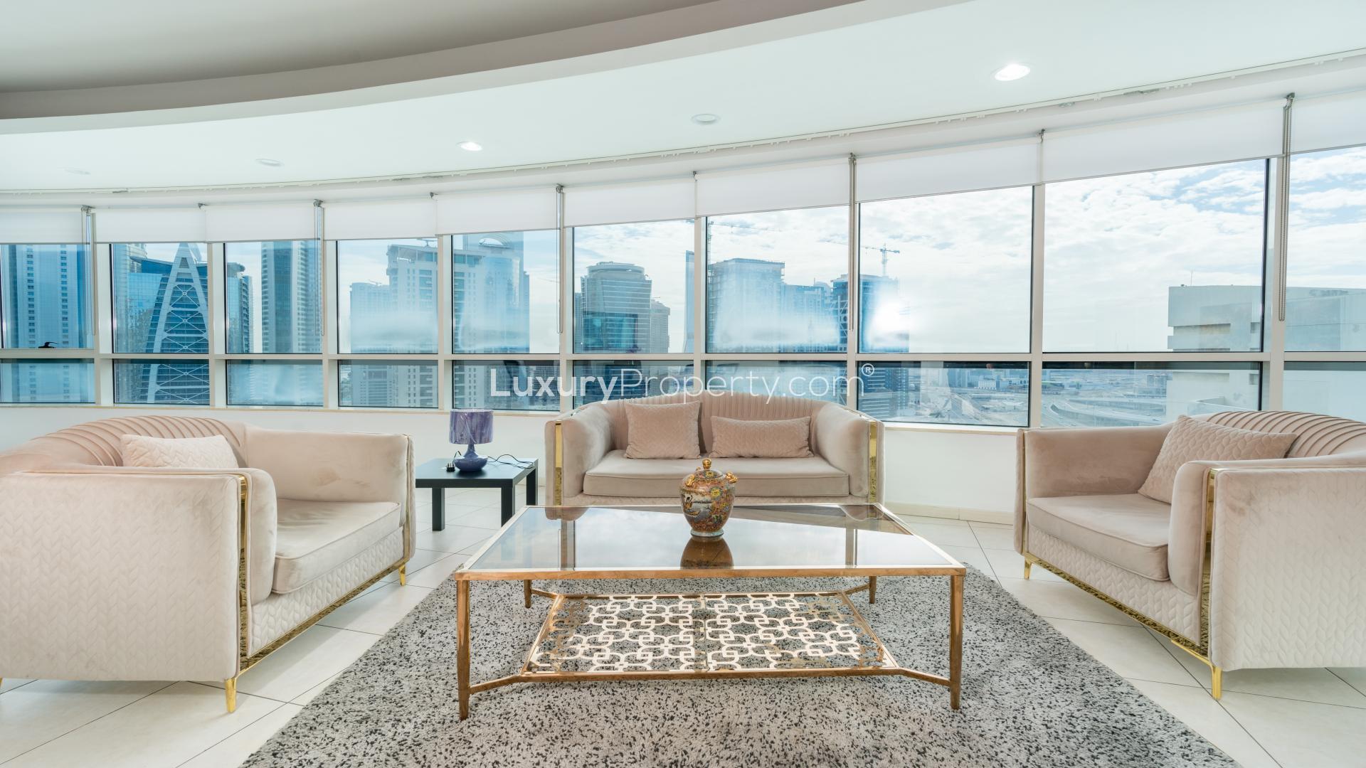 Furnished living area with Marina views in Horizon Tower, Dubai Marina apartment for rent