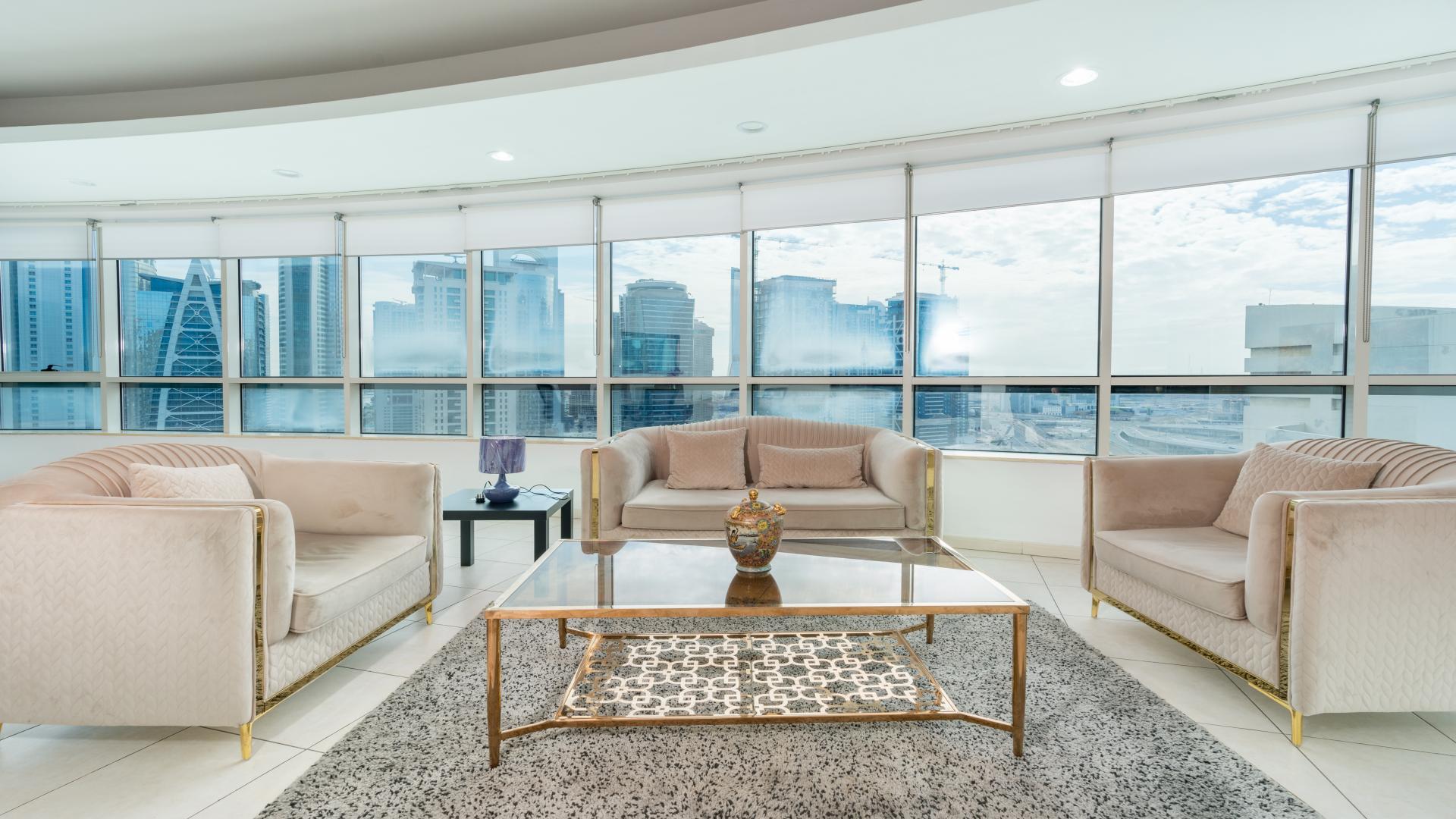 Furnished living area with Marina views in Horizon Tower, Dubai Marina apartment for rent