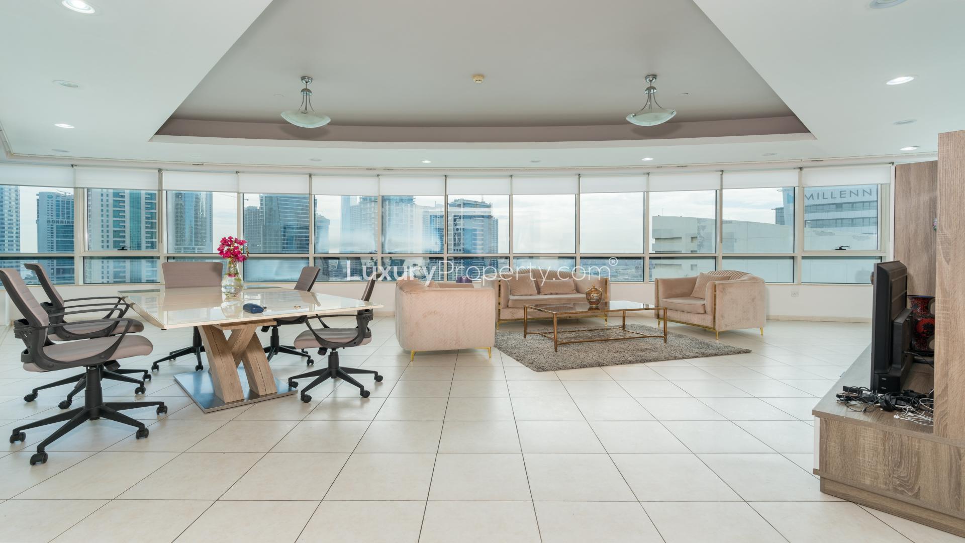 Furnished living room in Horizon Tower apartment with marina views, Dubai Marina