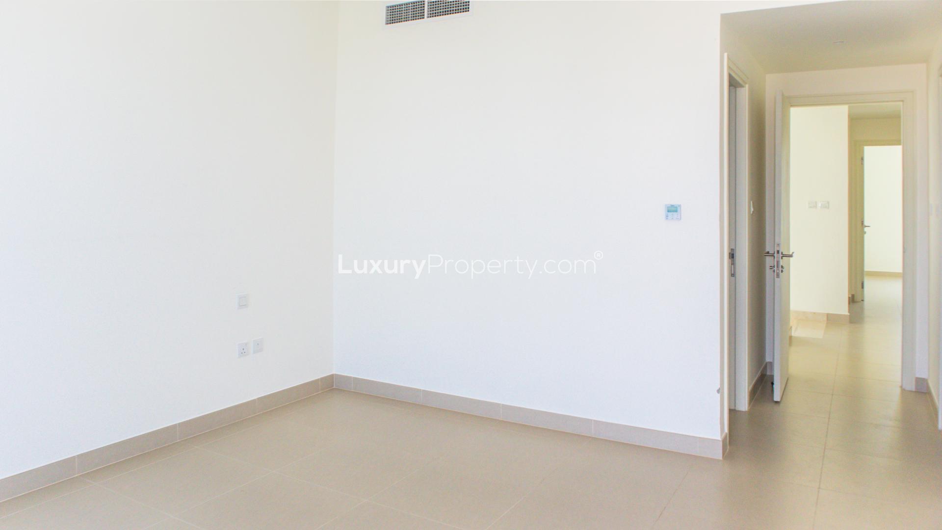 Bright room with large window overlooking garden in Maple townhouse, Dubai Hills Estate