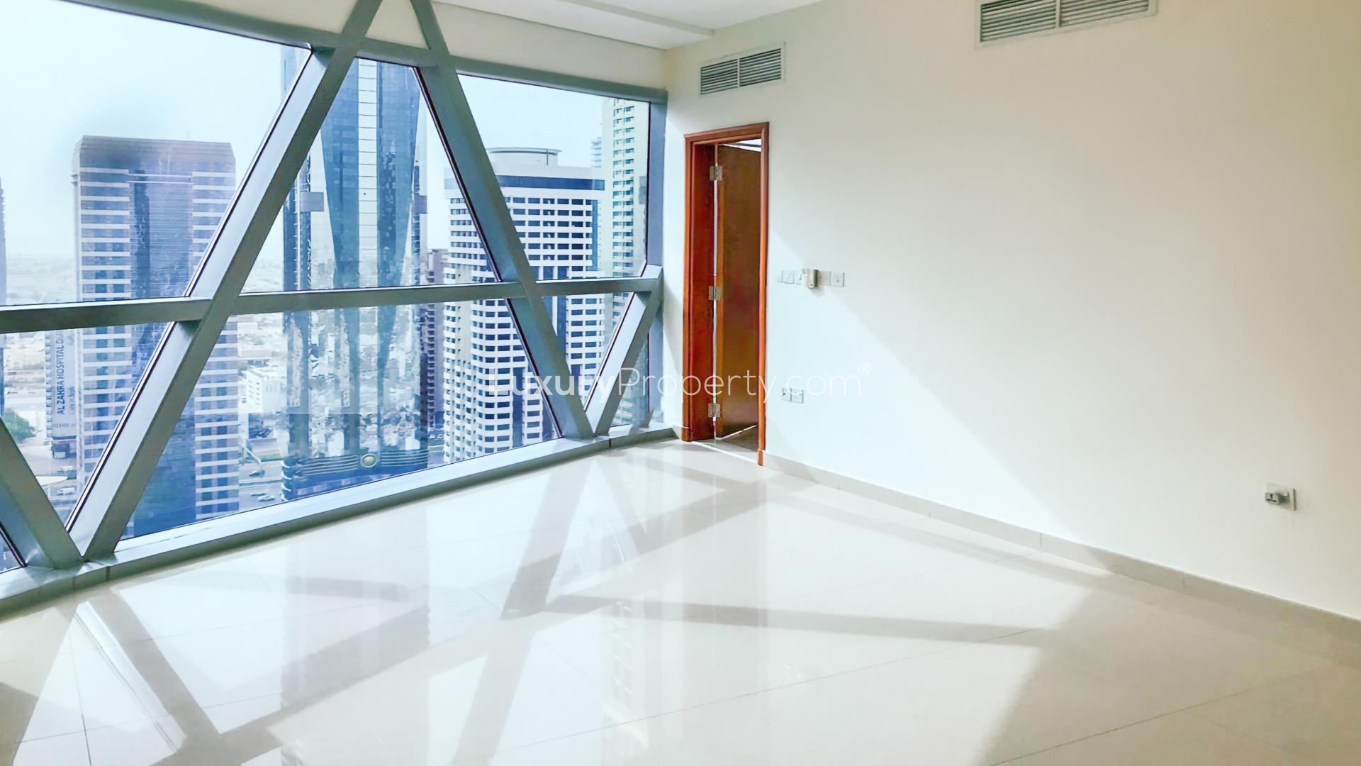 DIFC skyline view from Park Towers apartment, showcasing modern architecture and cityscape
