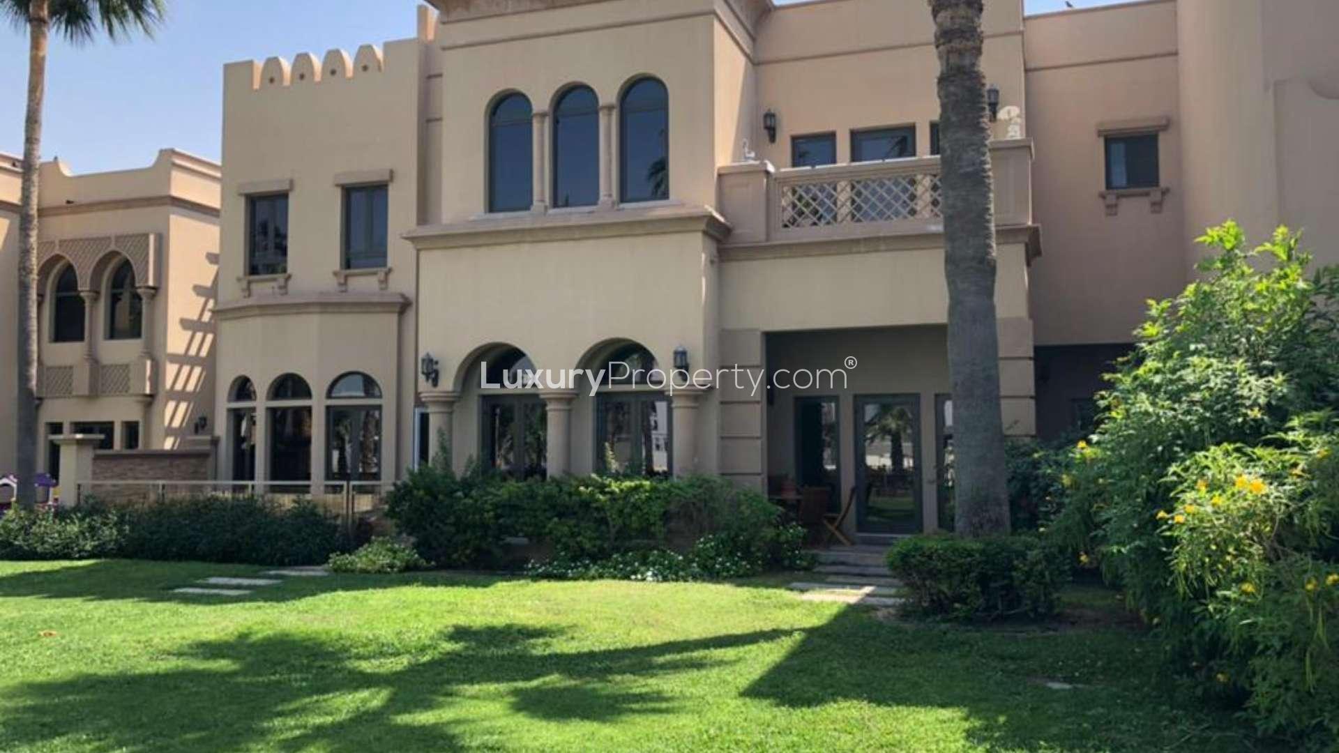 Beachfront villa with pool and palm trees in Palm Jumeirah, Canal Cove Villas