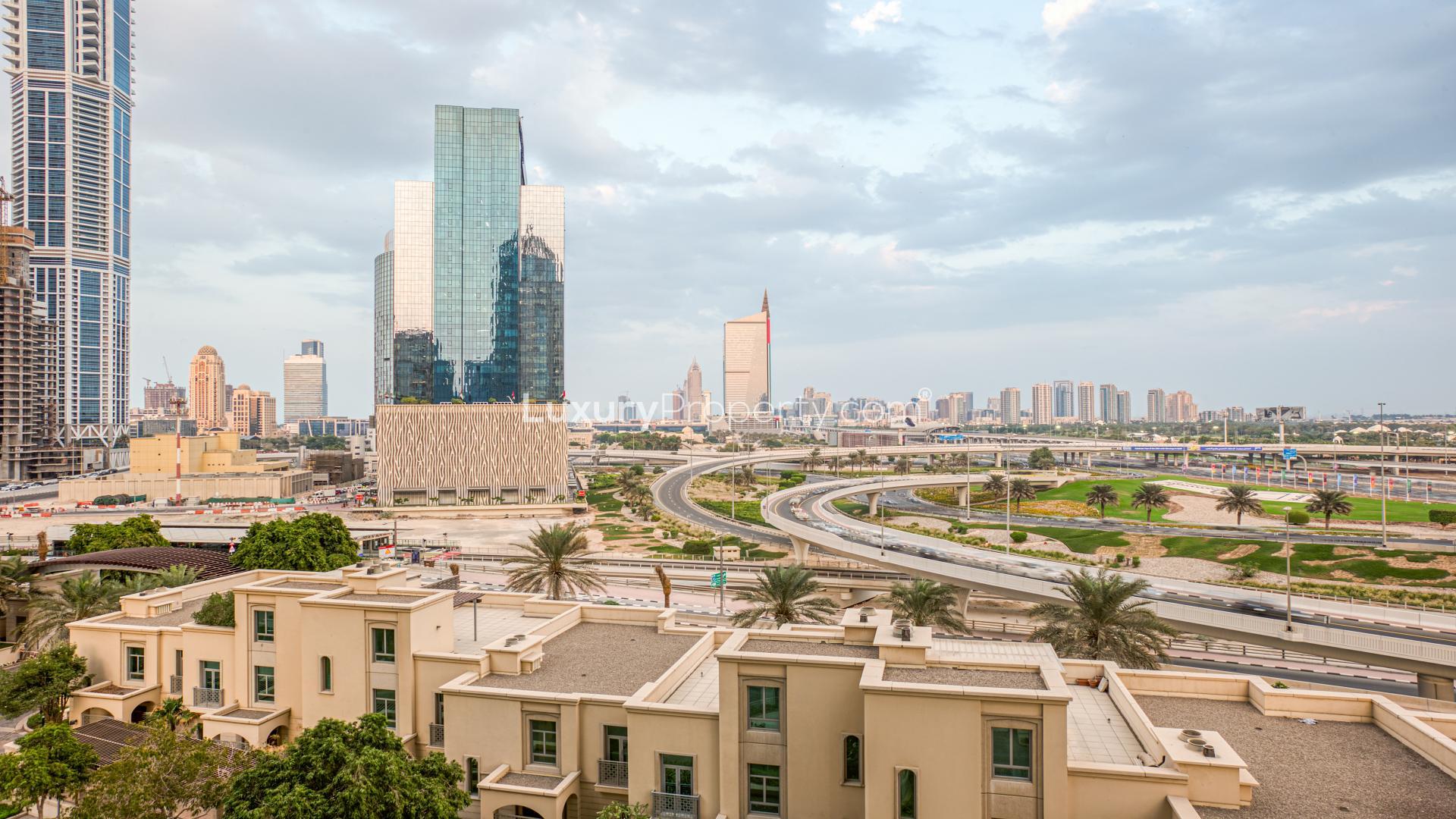 Balcony view of Dubai Marina skyline from Emaar 6 Towers apartment, one bedroom for sale