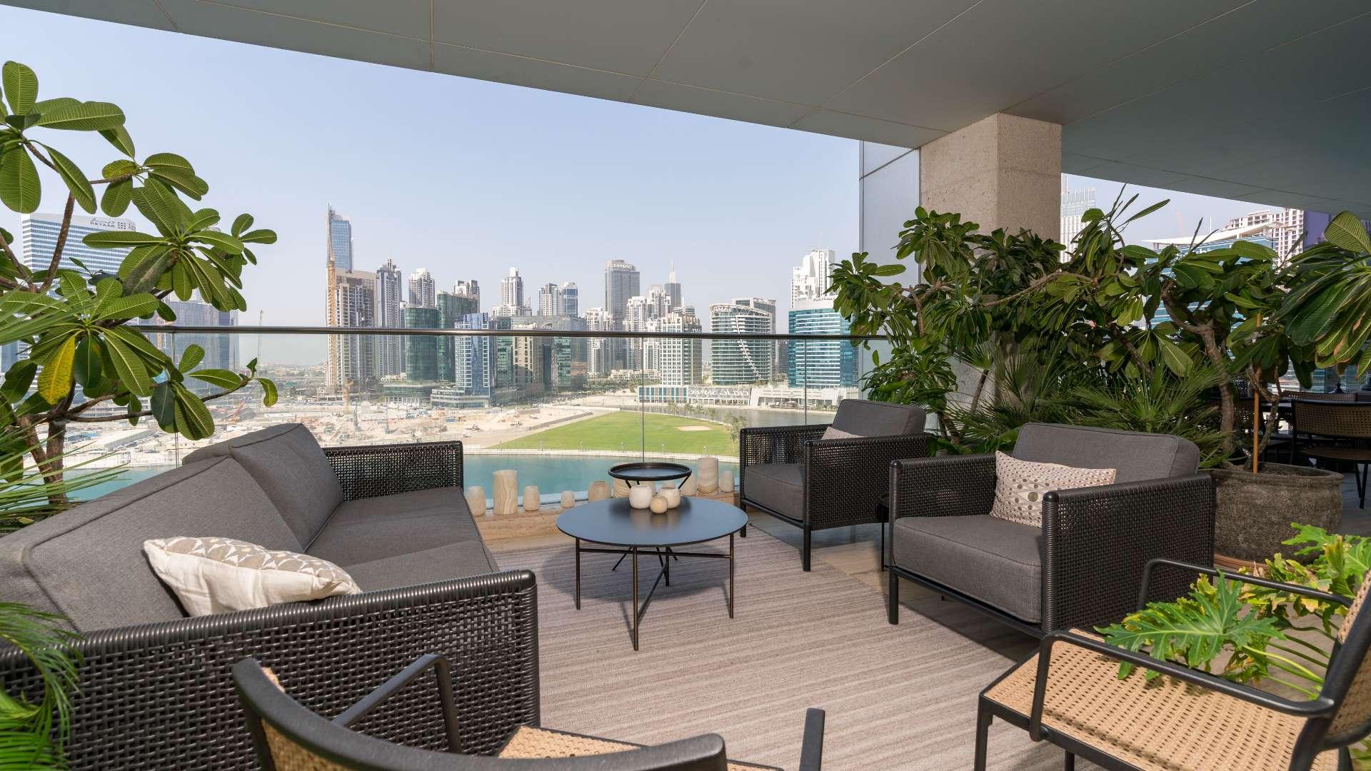 Luxurious living room in Volante penthouse, Business Bay, with modern decor and water views