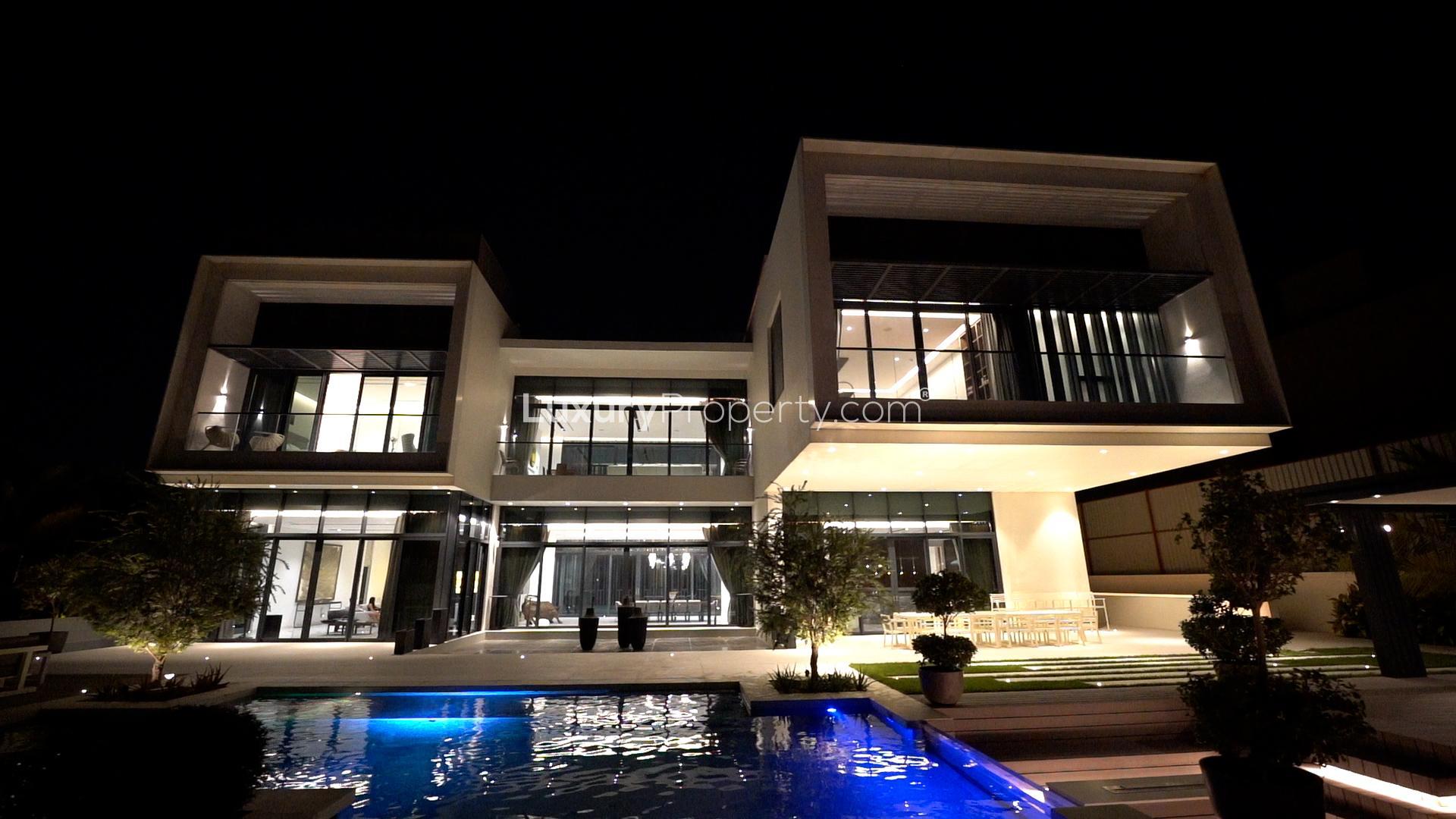 Luxurious 7-bedroom villa with pool view at night, Dubai Hills Mansions for sale