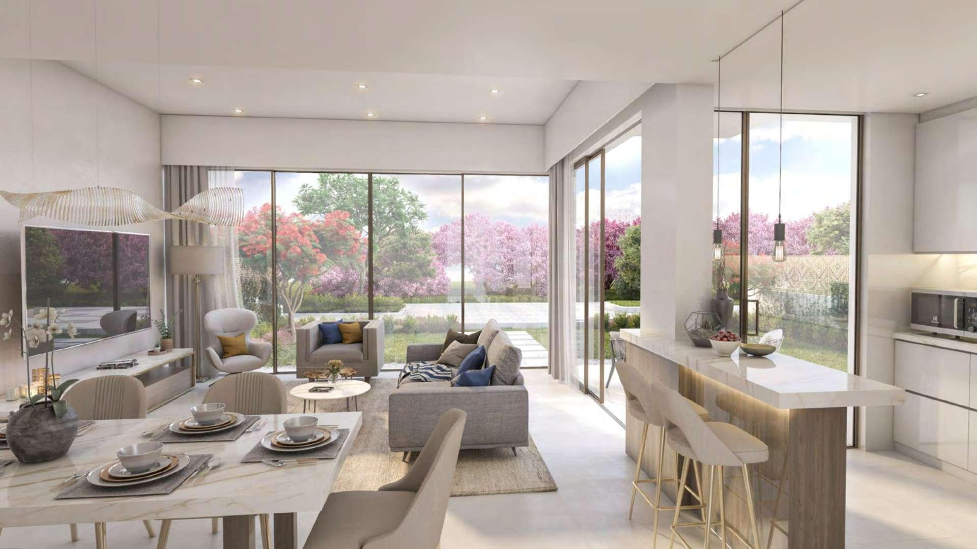 Modern 4-bedroom townhouse with garden on large corner plot in Cherrywoods, Dubai Land