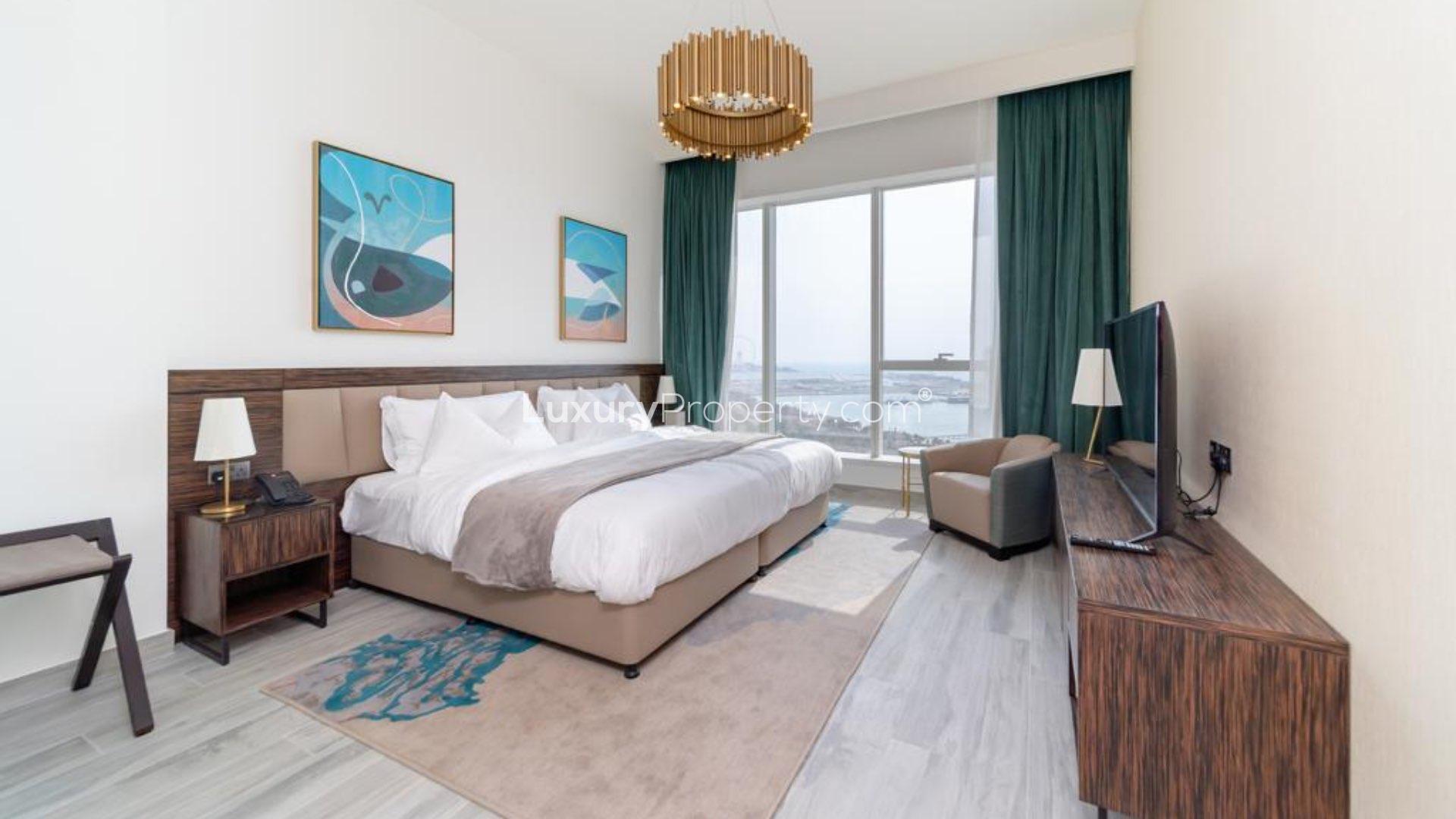 Luxury living room with sea view in Avani Palm View, Dubai Media City apartment