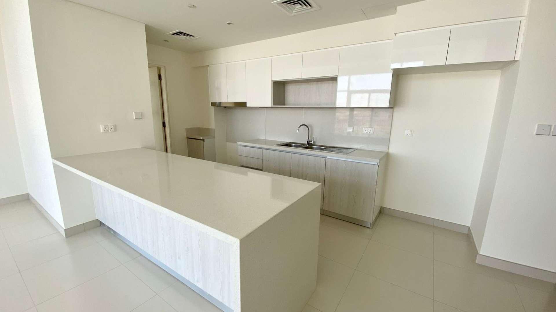 Spacious living area with open kitchen in 3-bedroom apartment, Park Point, Dubai Hills Estate