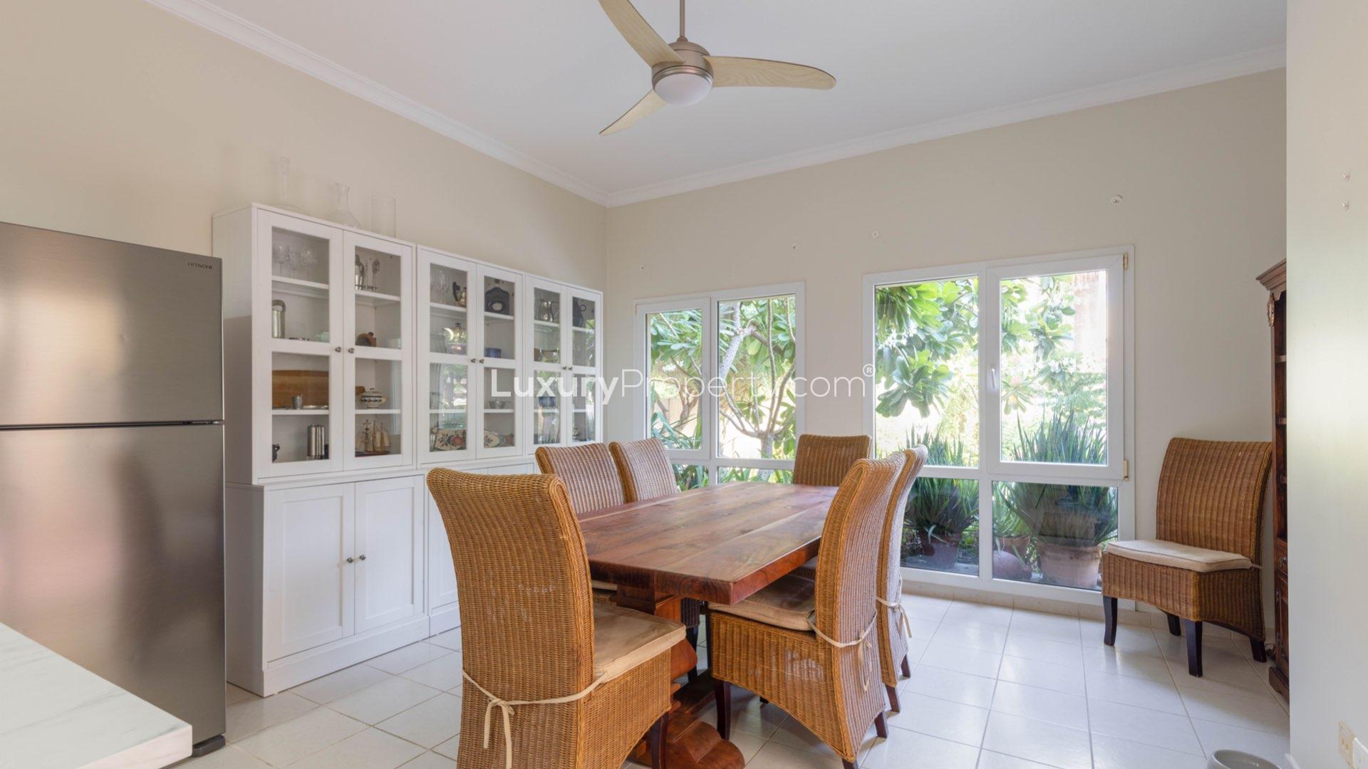 4-bedroom villa exterior with lush garden in Meadows 8, Emirates Living