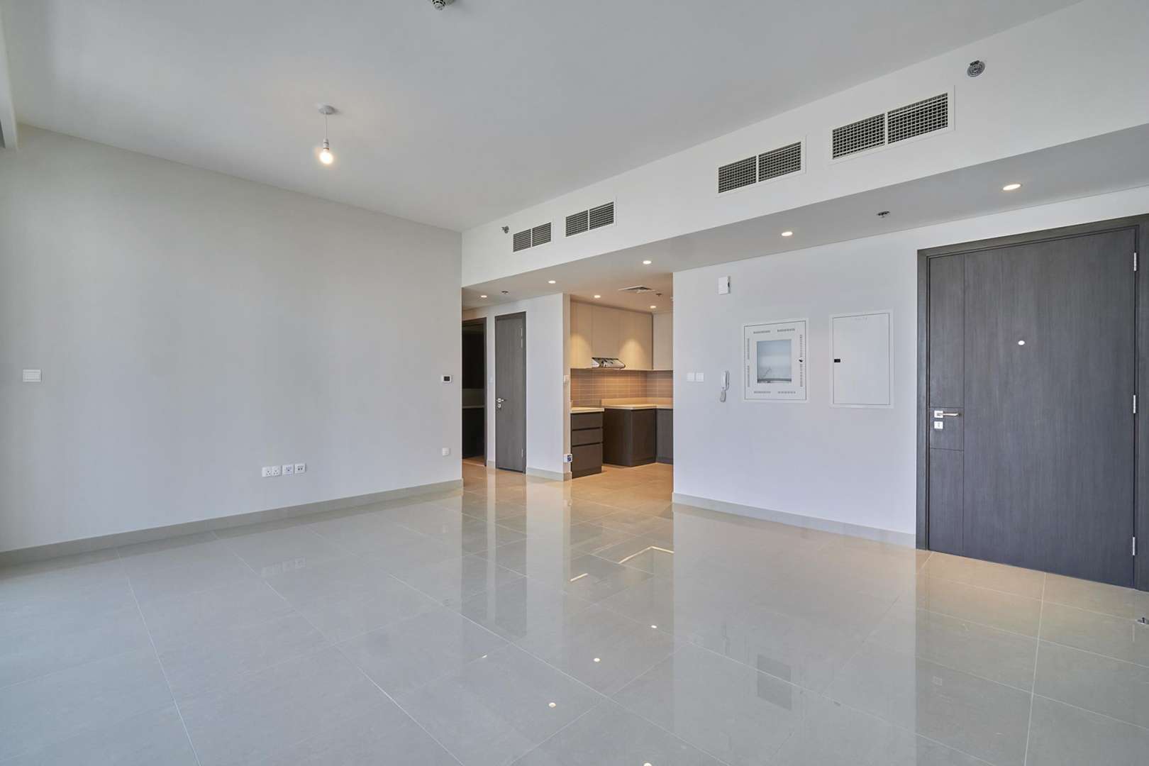 Bright living room with large windows in Harbour Views apartment, Dubai Creek Harbour