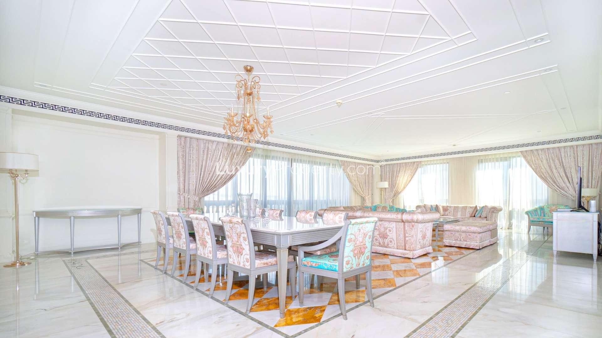 "Palazzo Versace apartment with pool view, water views, and modern architecture in Culture Village.",Luxurious Palazzo Versace apartment with Versace furniture, elegant design, and spacious layout in Culture Village