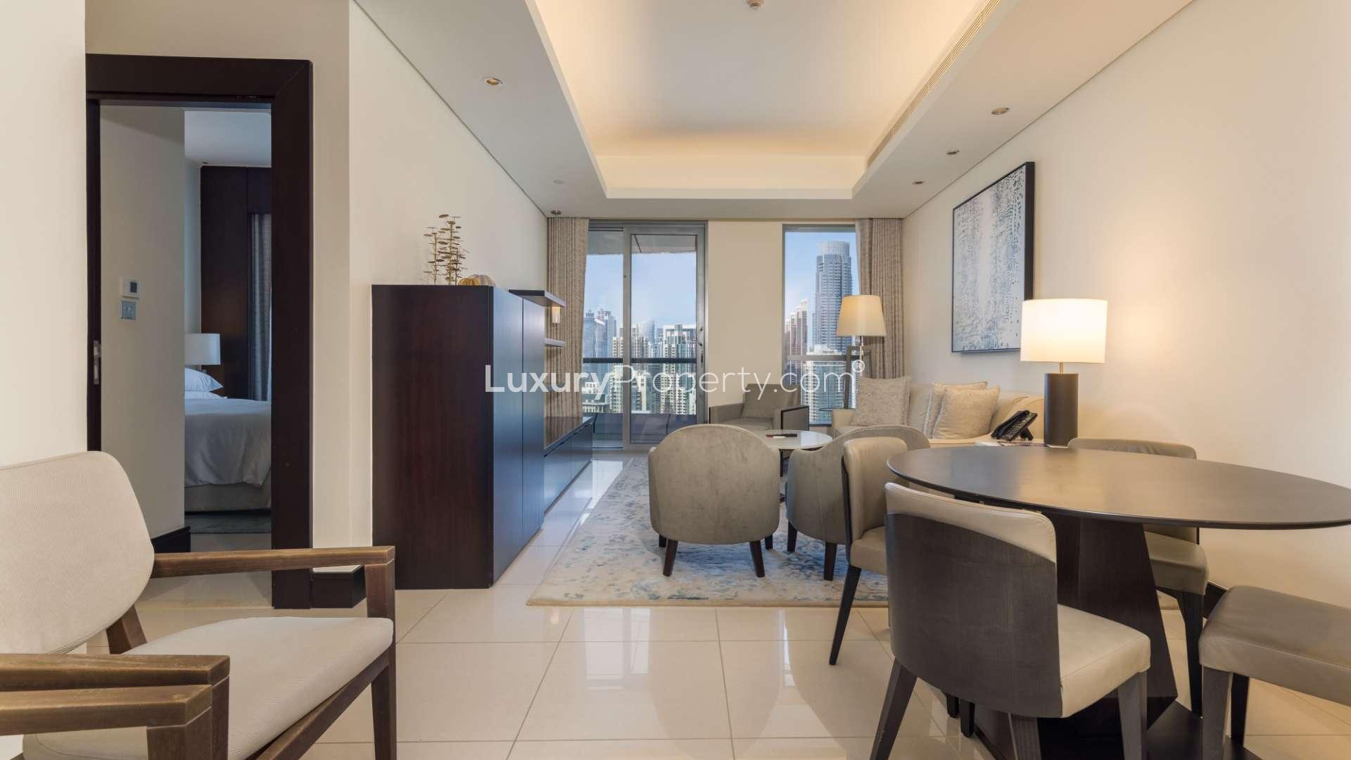 Furnished living area in one-bed apartment, Downtown Dubai, Burj Lake Hotel view