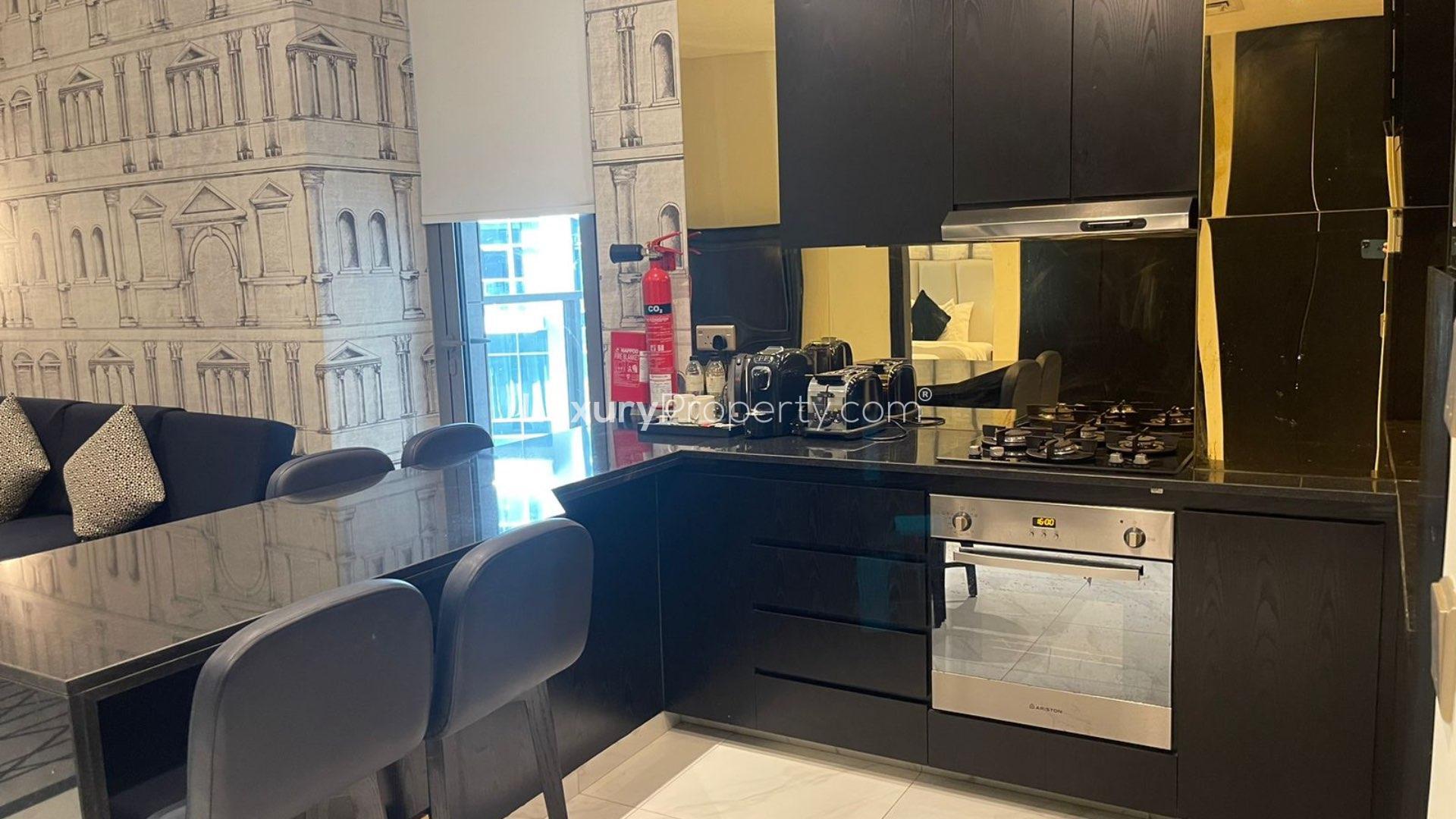 Modern furnished living area in Business Bay apartment, The Atria, with stylish decor